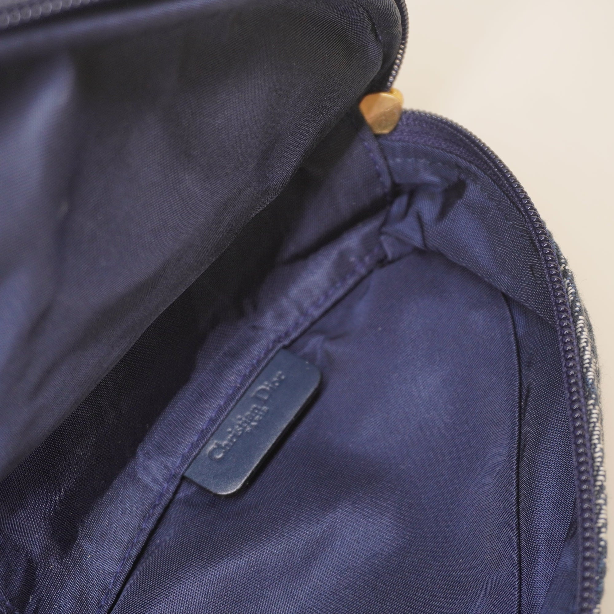 PRE-OWNED Monogram Mini Saddle Zip Pouch Navy Blue