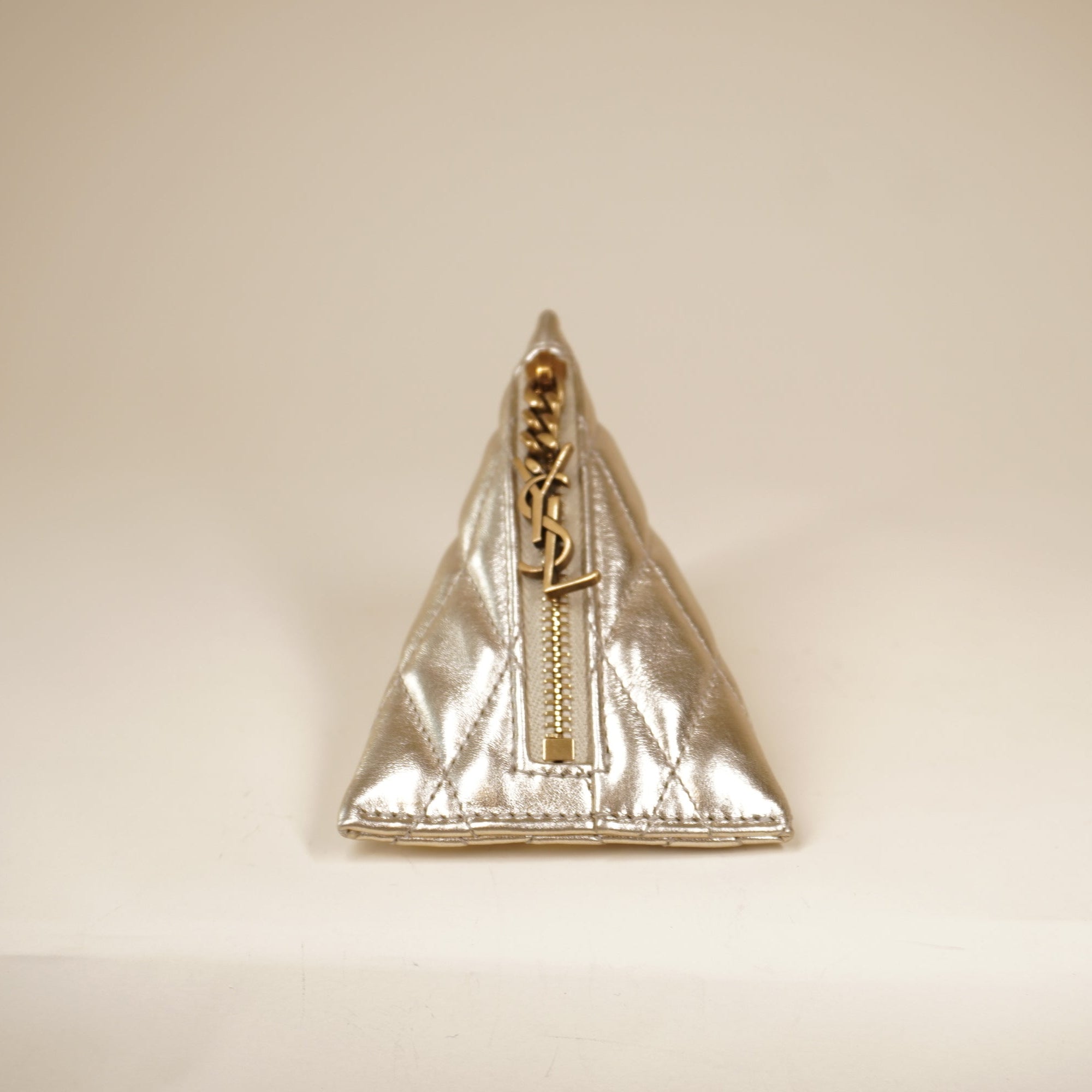 PRE-OWNED Metallic Calfskin Berlingo Bag Charm Champagne Gold