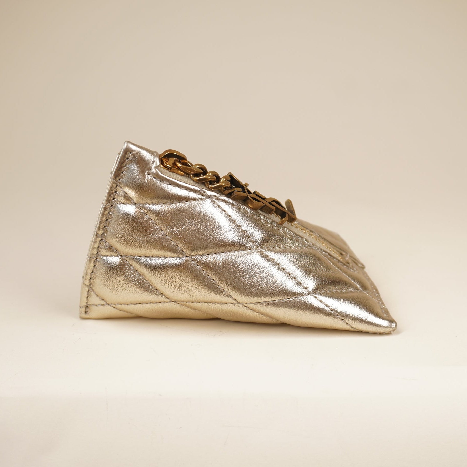 PRE-OWNED Metallic Calfskin Berlingo Bag Charm Champagne Gold