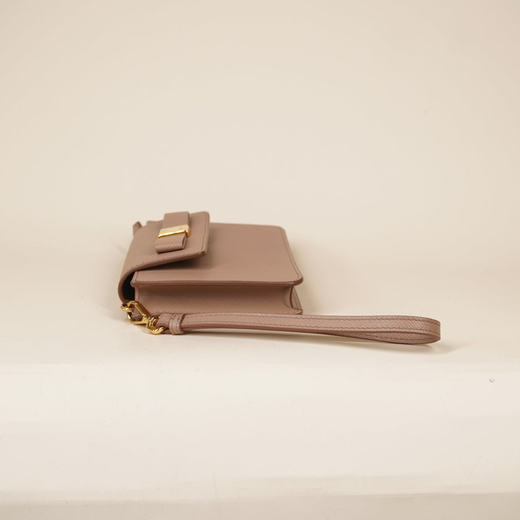 PRE-OWNED Beige Saffiano Bow Wristlet Clutch