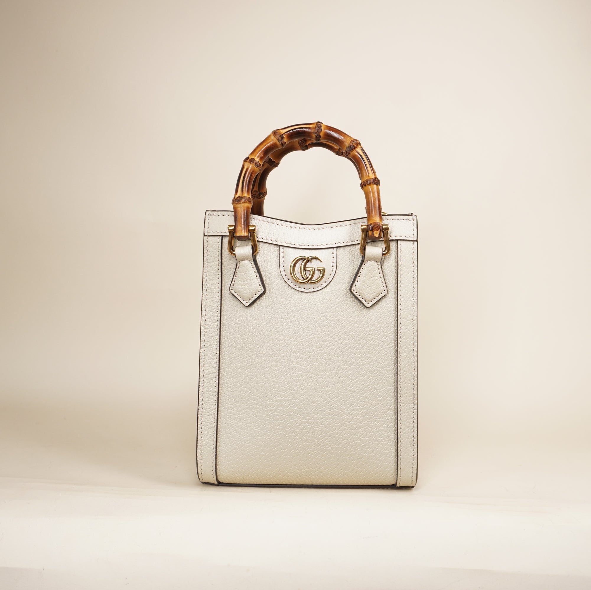PRE-OWNED GG Cream Diana Mini Vertical Tote Shoulder Bag