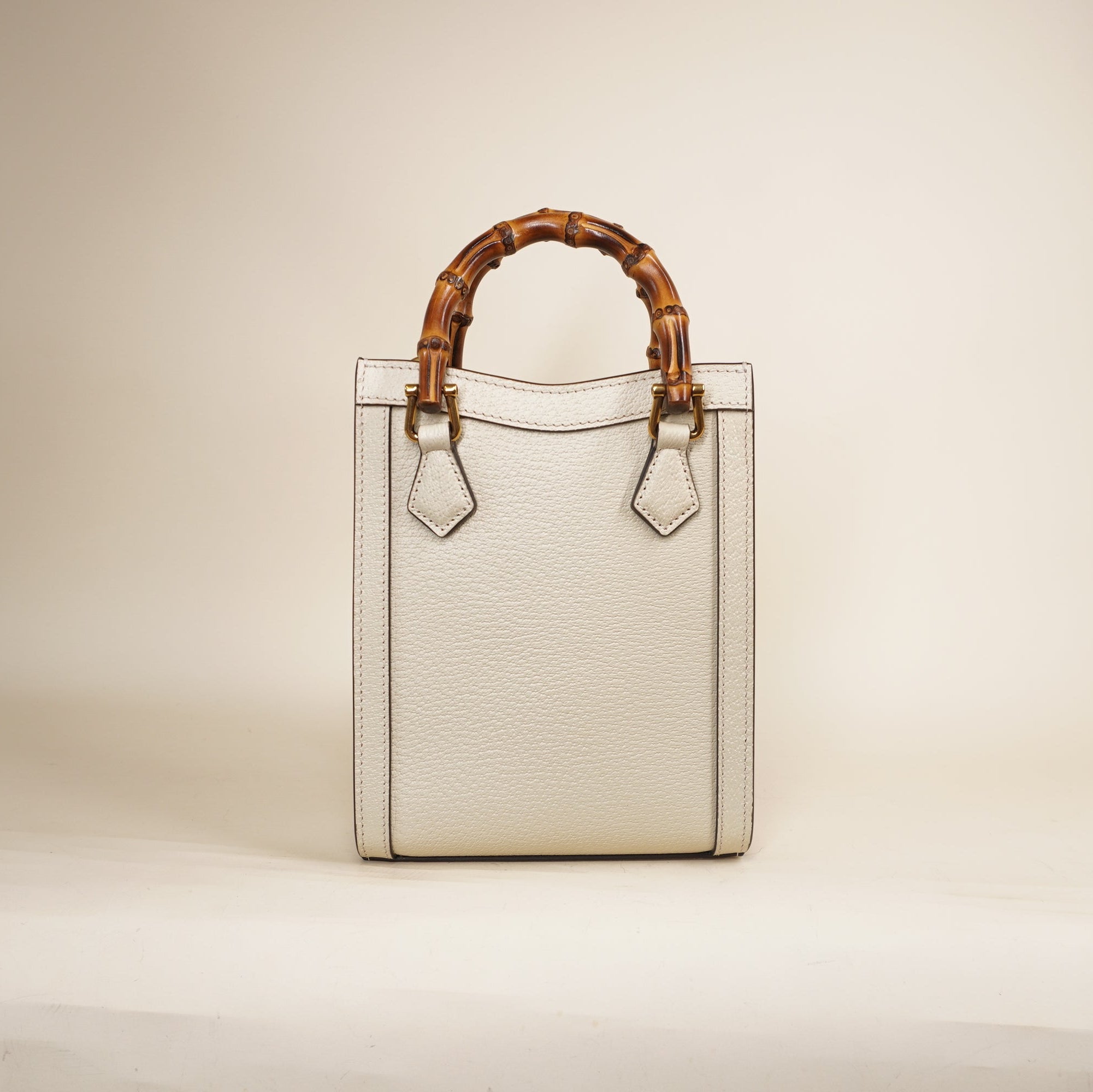 PRE-OWNED GG Cream Diana Mini Vertical Tote Shoulder Bag