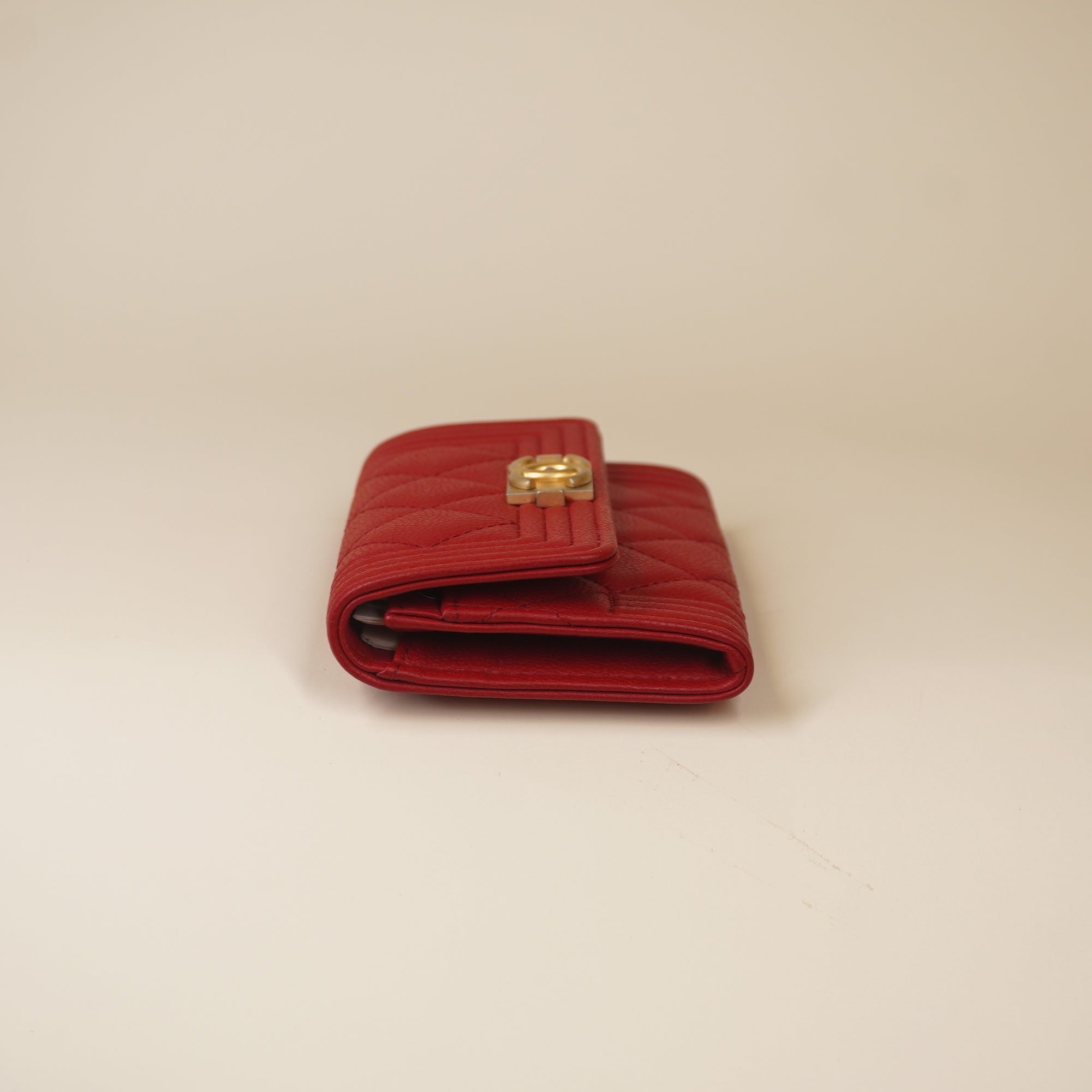 PRE-OWNED CC Red Caviar Quilted Boy Flap Card Holder