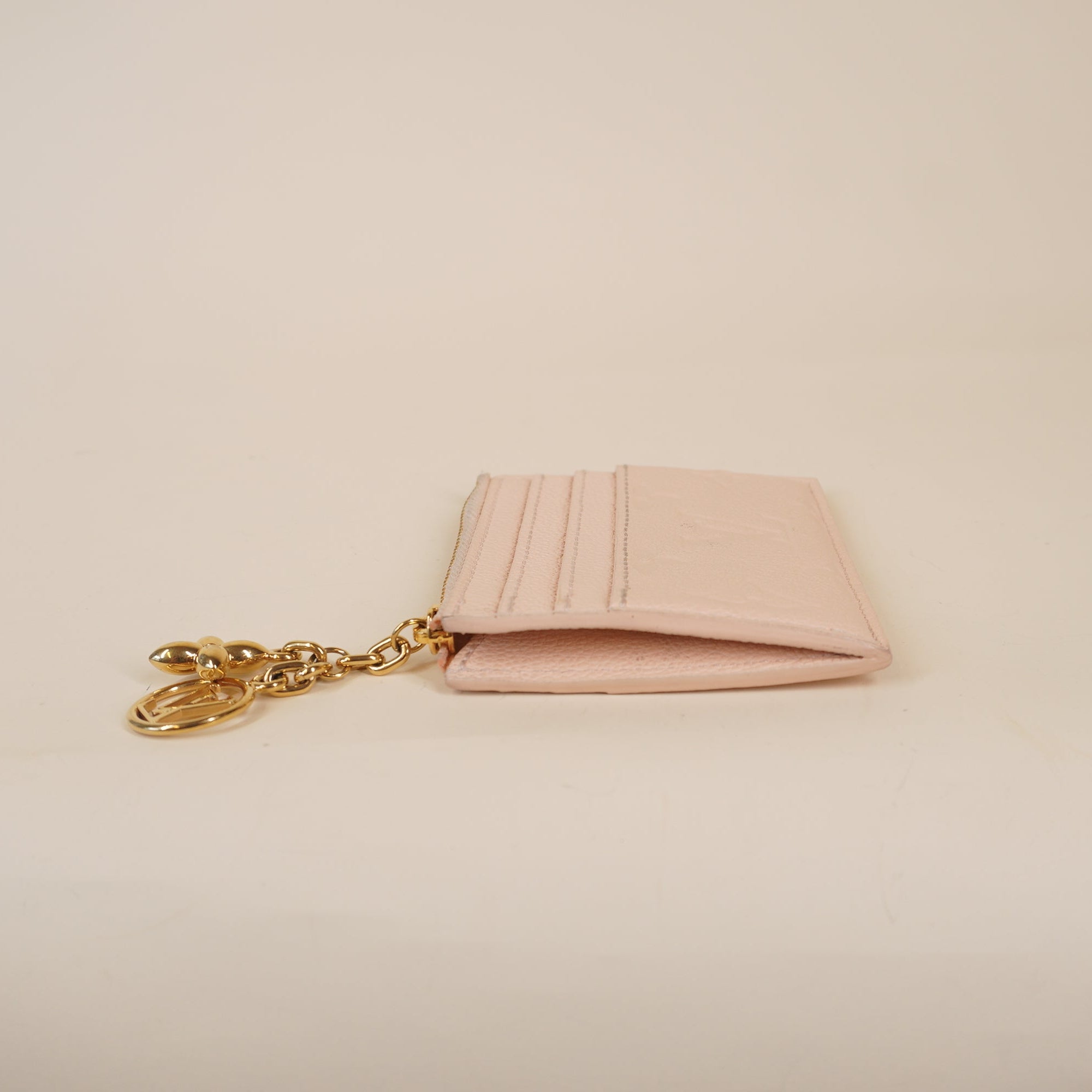 PRE-OWNED LV Portecarte Flora Empreinte Card Case Pink