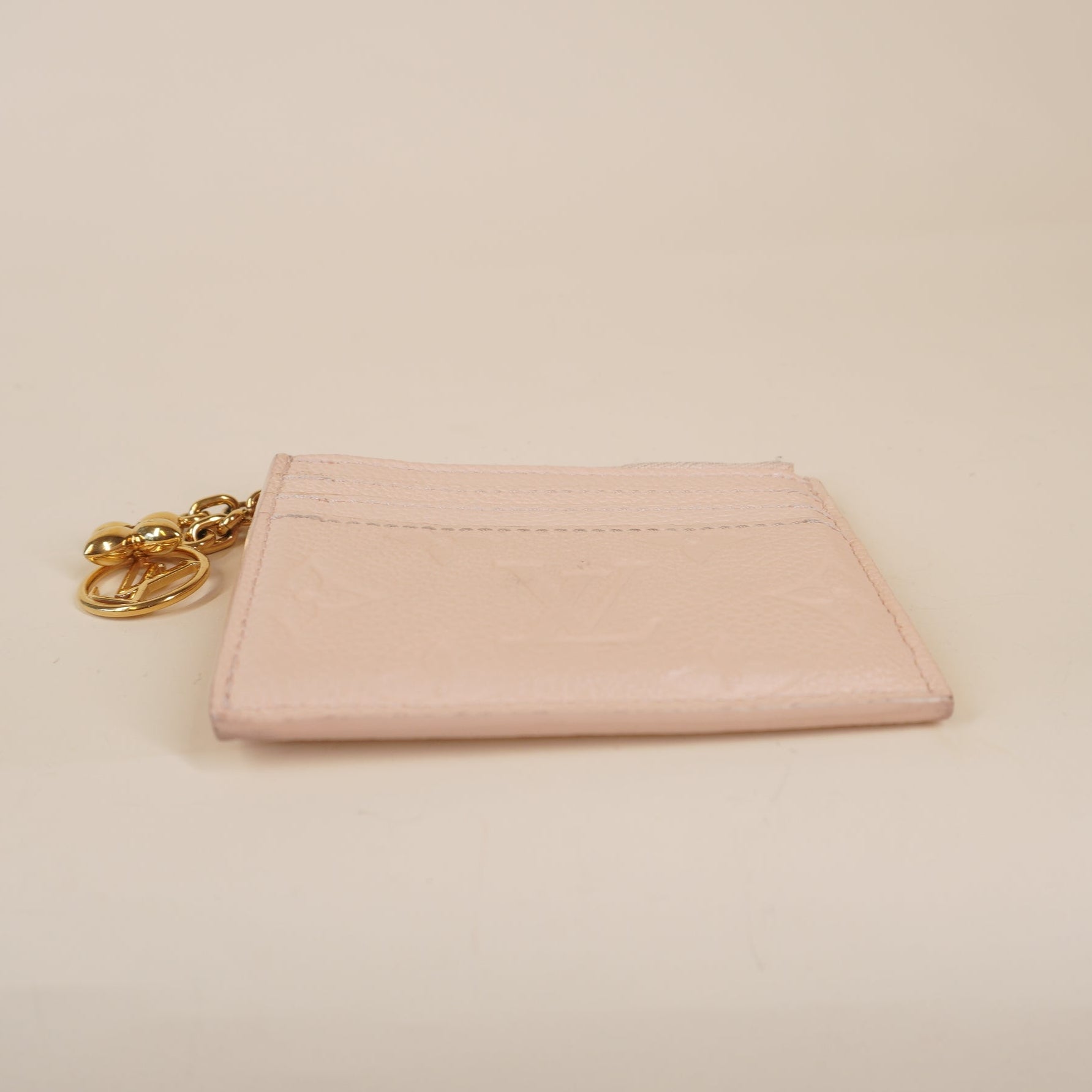 PRE-OWNED LV Portecarte Flora Empreinte Card Case Pink