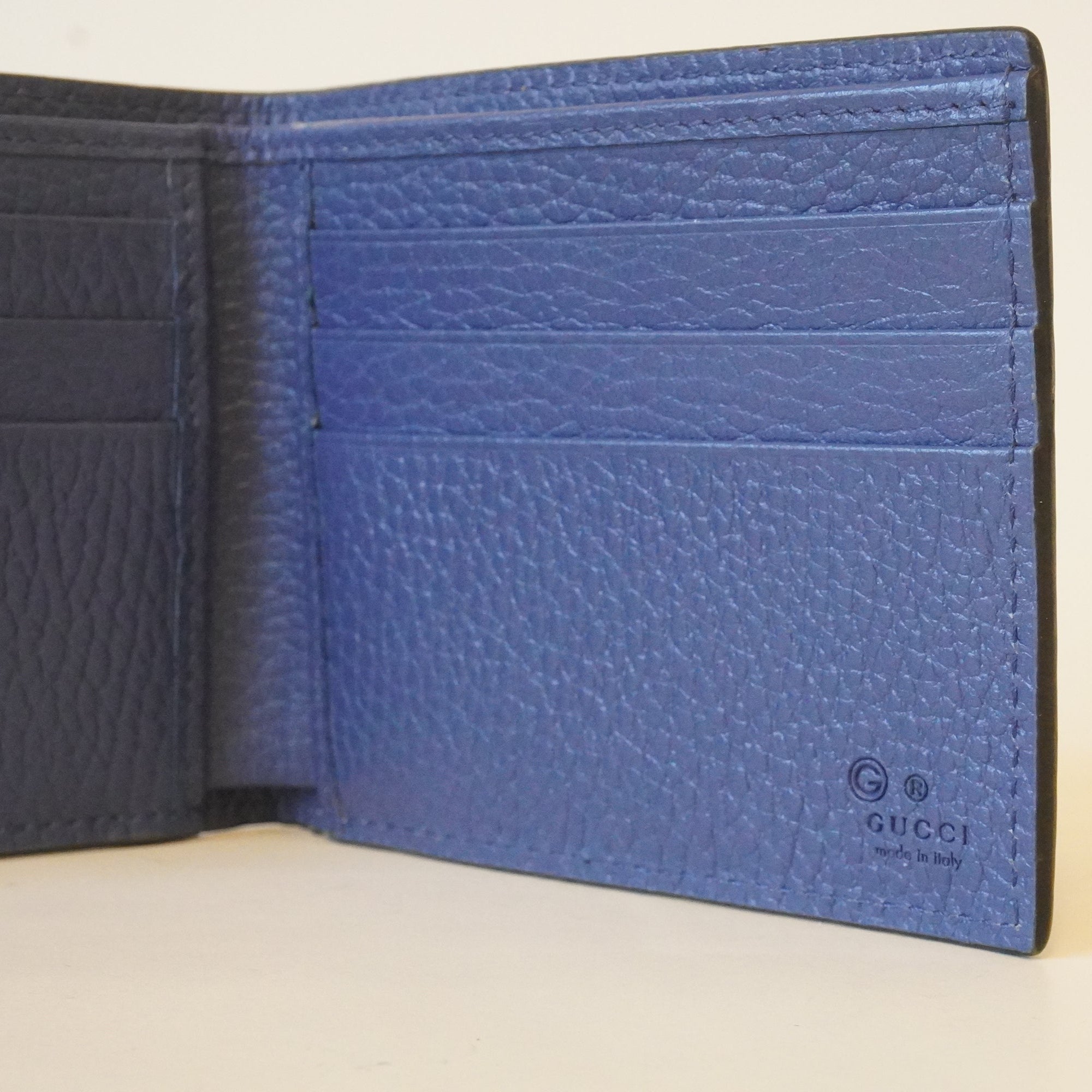 PRE-OWNED GG Black Leather Interlocking G Bi-Fold Wallet
