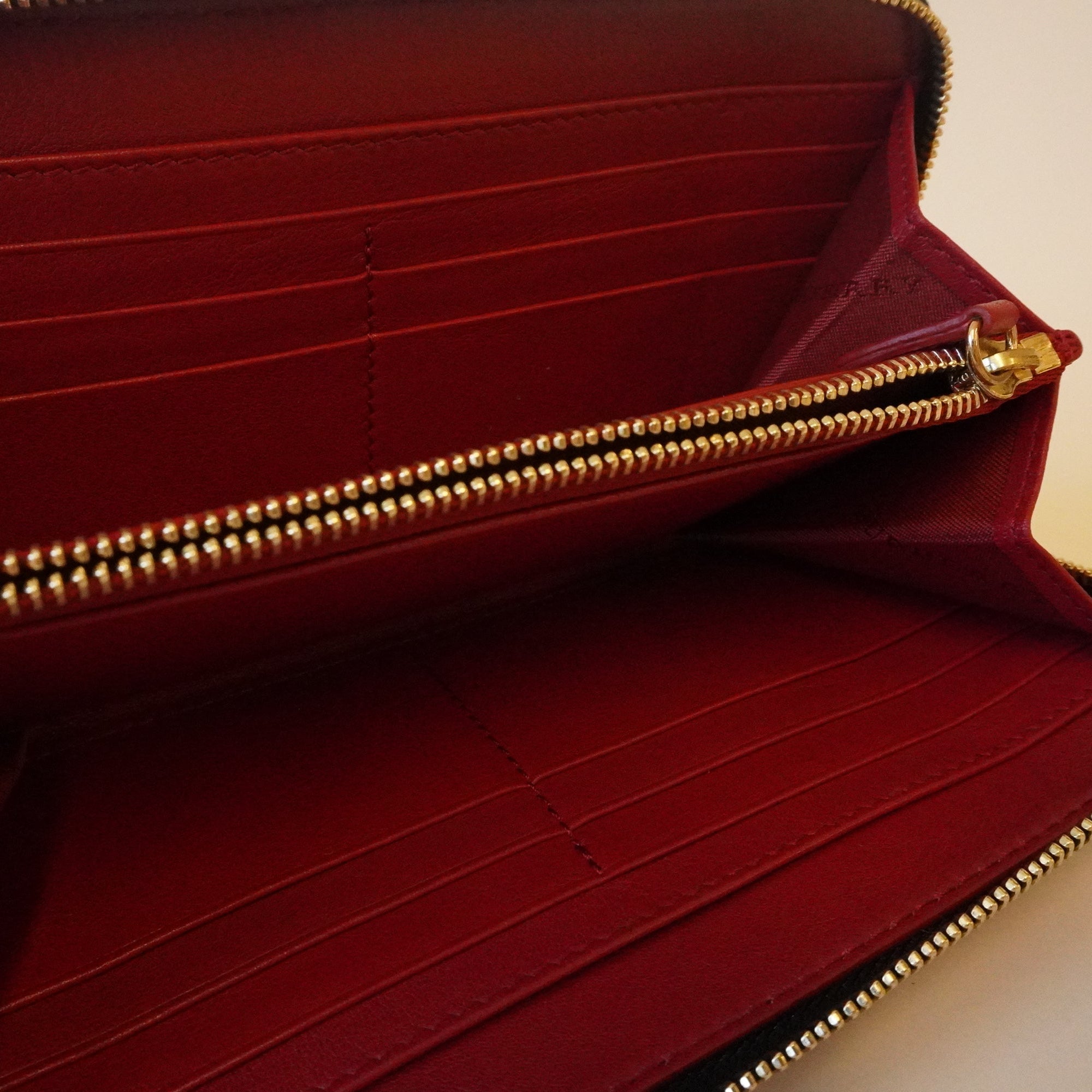 PRE-OWNED Red Grainy Calfskin House Check Elmore Zip Around Wallet