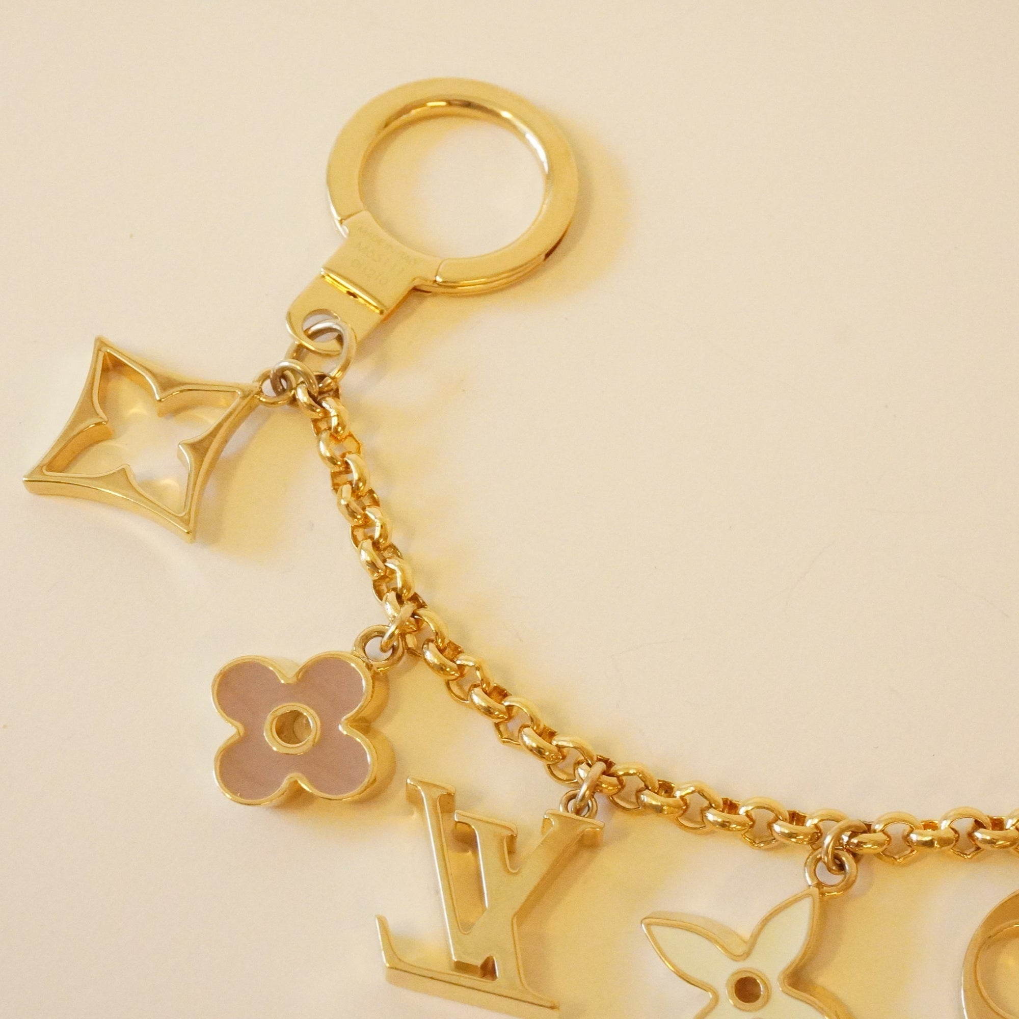 PRE-OWNED LV Gold Chain Brass Enamel Fleur De Monogram Bag Charm