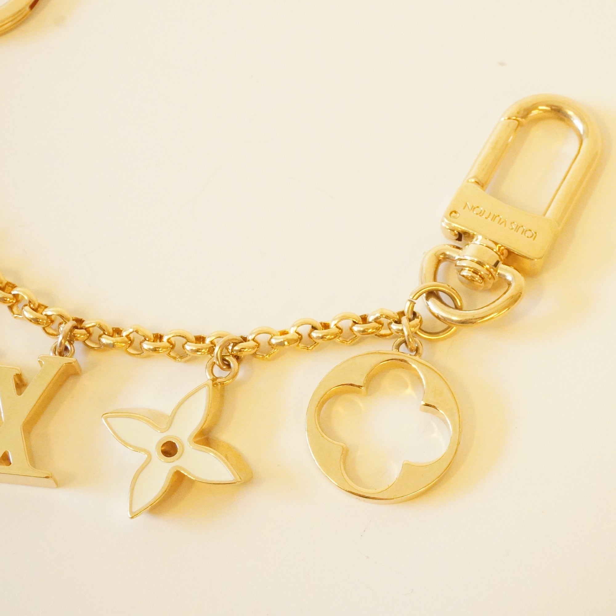 PRE-OWNED LV Gold Chain Brass Enamel Fleur De Monogram Bag Charm