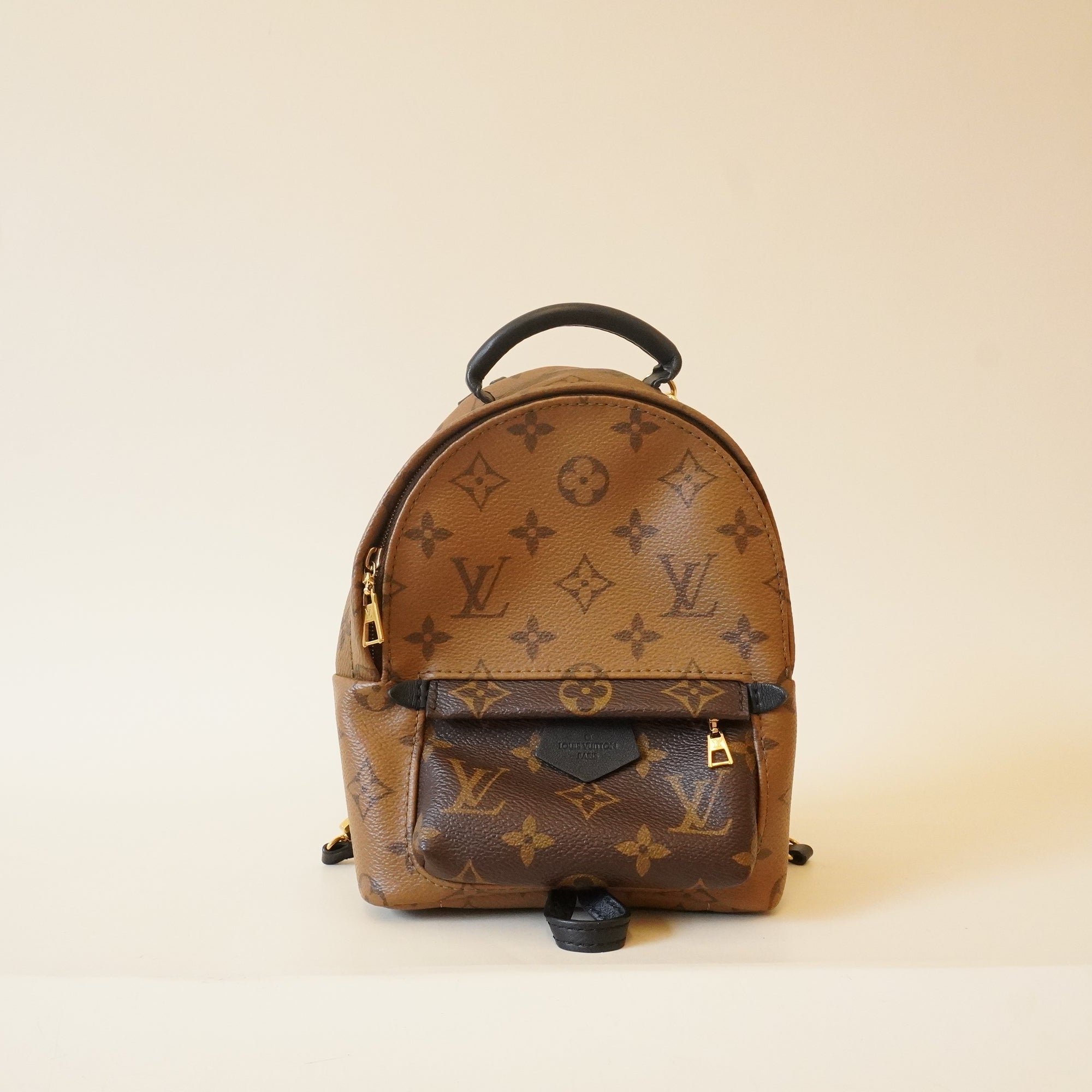 PRE-OWNED LV Monogram Canvas Reverse Mini Palm Spring Backpack