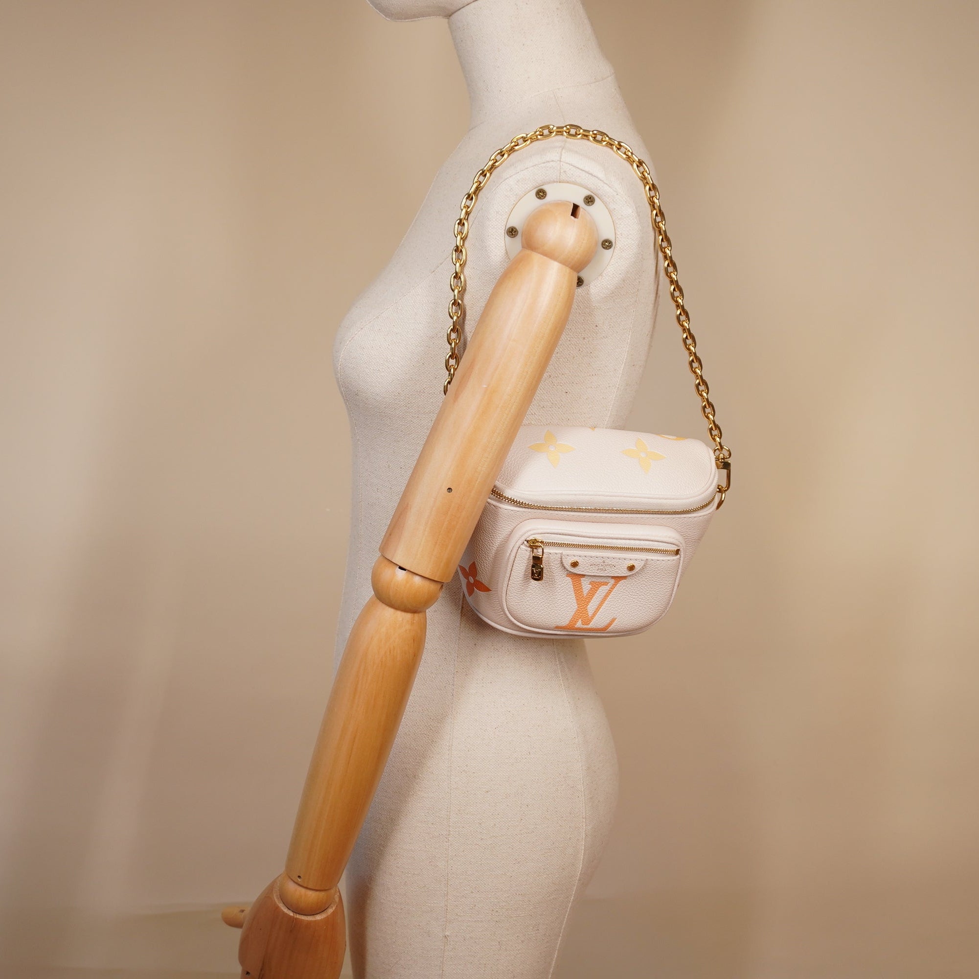 PRE-OWNED LV Empreinte Mini Bumbag Cream