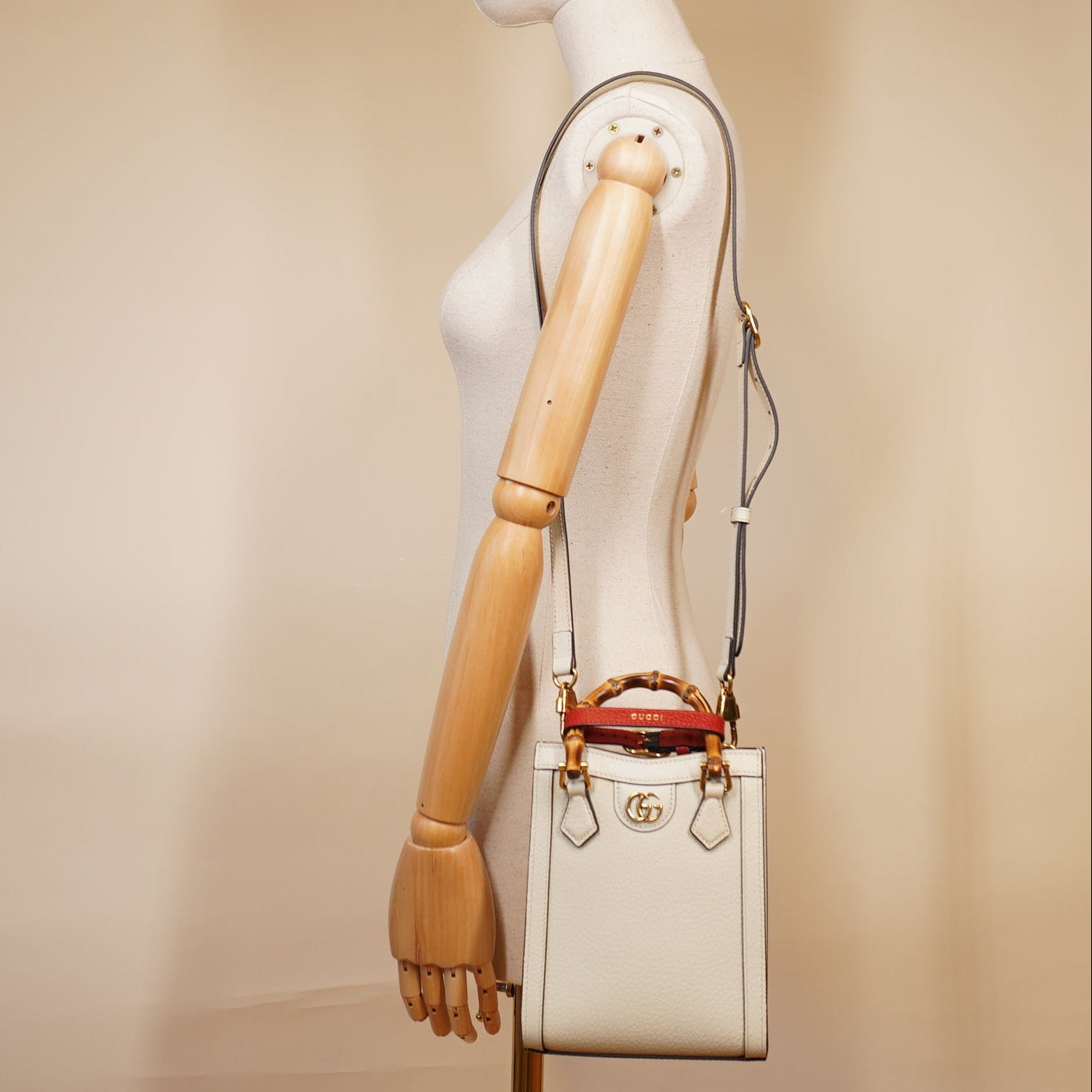 PRE-OWNED GG Cream Diana Mini Vertical Tote Shoulder Bag