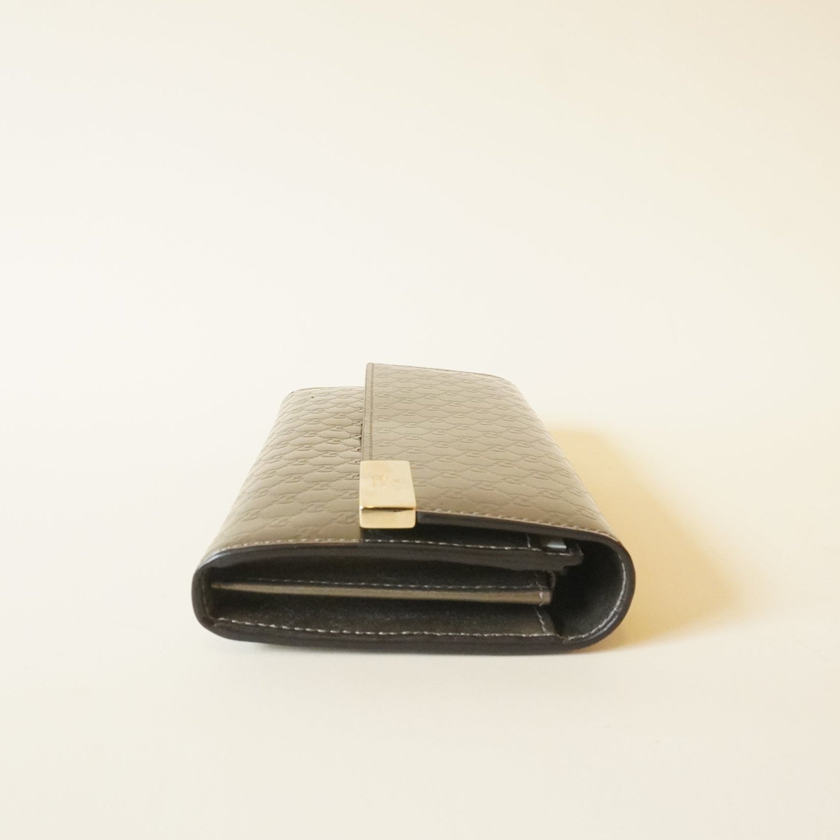 PRE-OWNED Metallic Grey Microguccissima Patent Leather Continental Wallet
