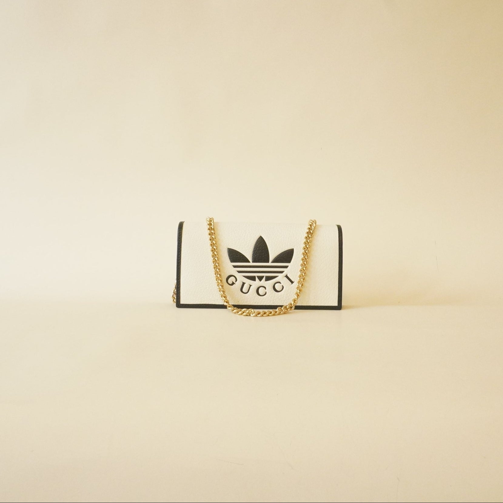 PRE-OWNED X ADIDAS Textured Dollar Calfskin Trefoil Embossed Wallet On Chain Off White Black