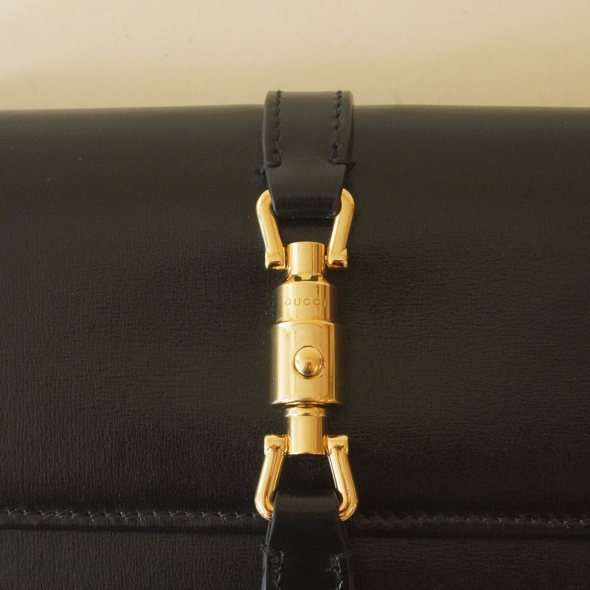 PRE-OWNED Calfskin Jackie 1961 Chain Wallet Black