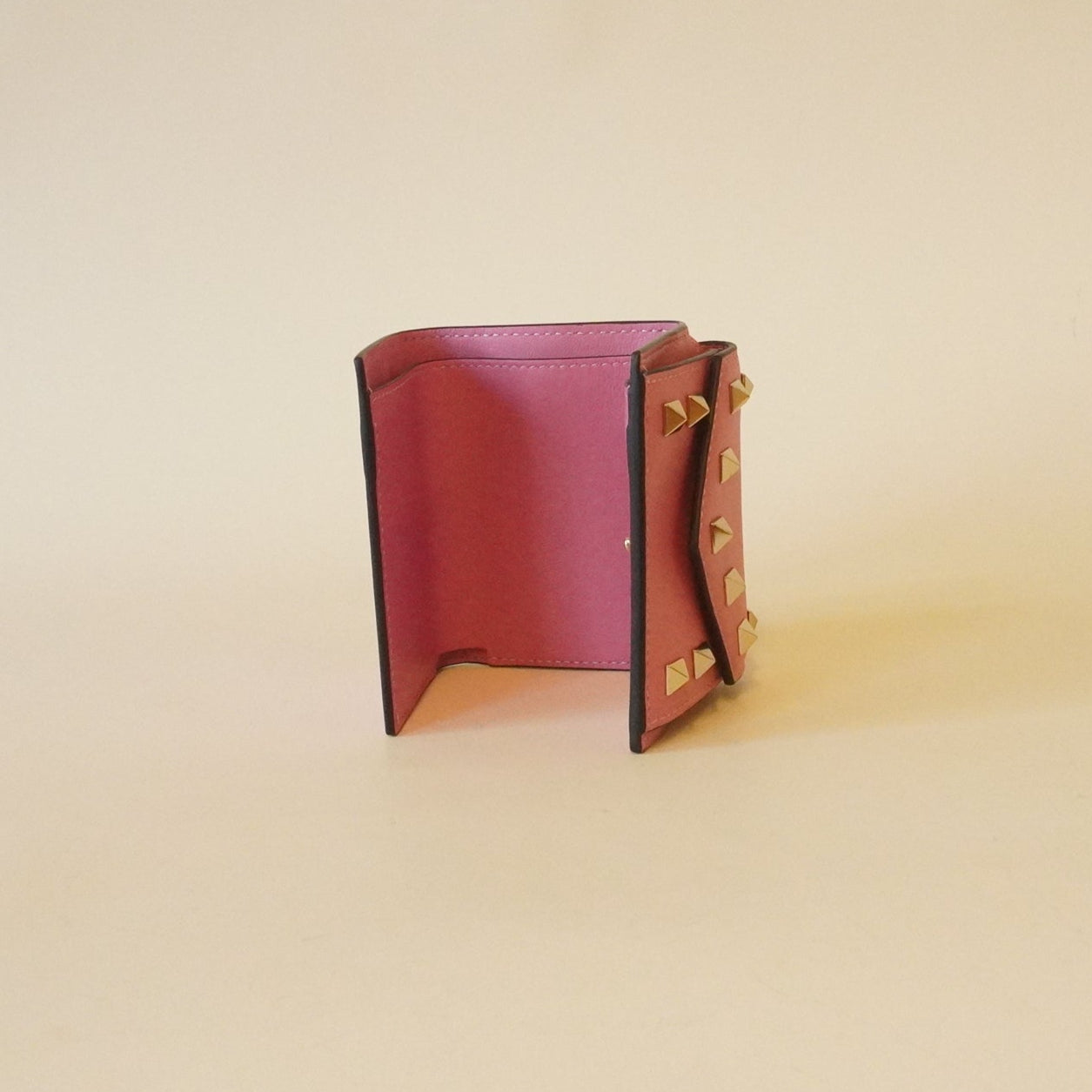 PRE-OWNED Rockstud Trifold Wallet Pink Leather Hardware