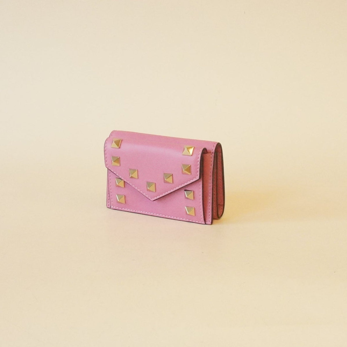 PRE-OWNED Rockstud Trifold Wallet Pink Leather Hardware