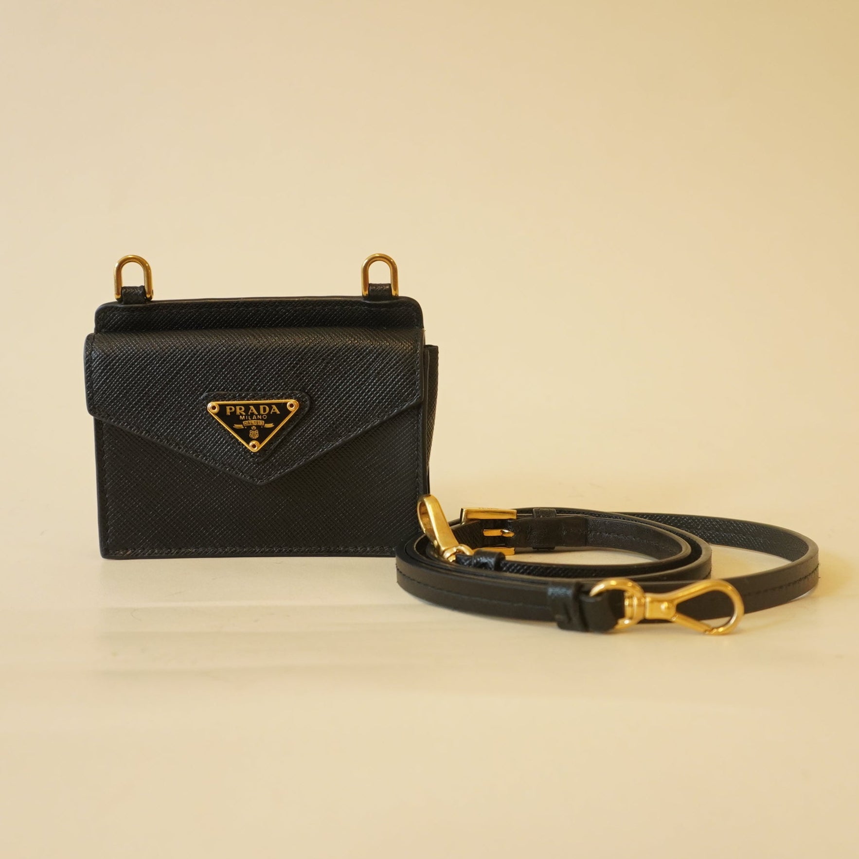 PRE-OWNED Saffiano Triangle Card Holder On Strap Black