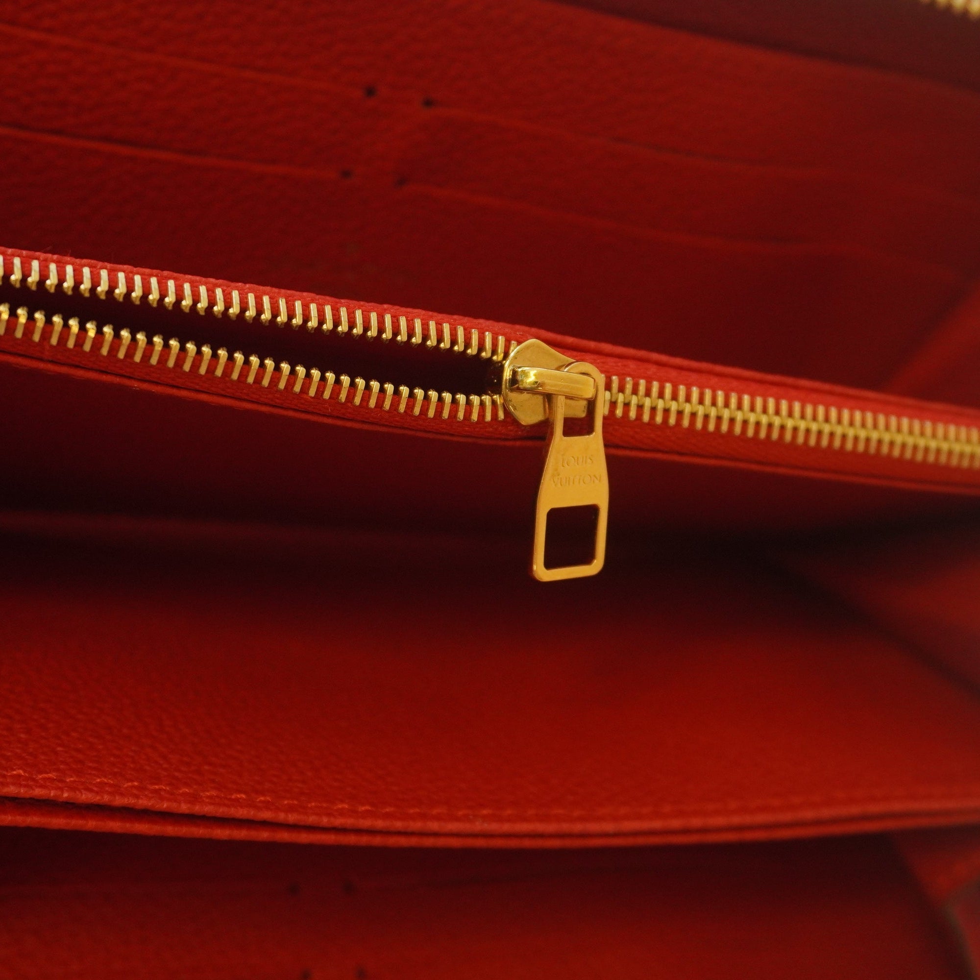 PRE-OWNED - Red Monogram Empreinte Leather Zippy Wallet
