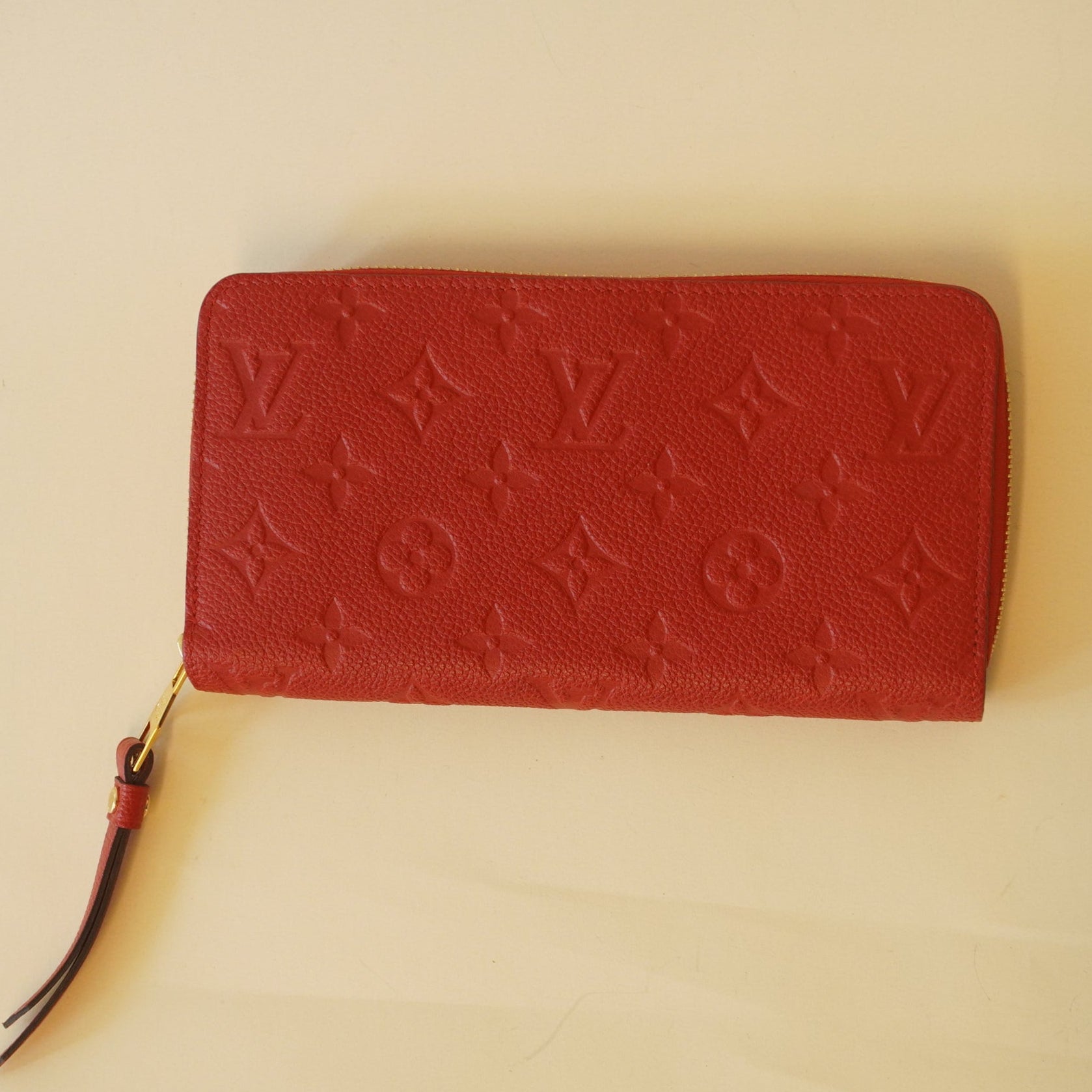 PRE-OWNED - Red Monogram Empreinte Leather Zippy Wallet