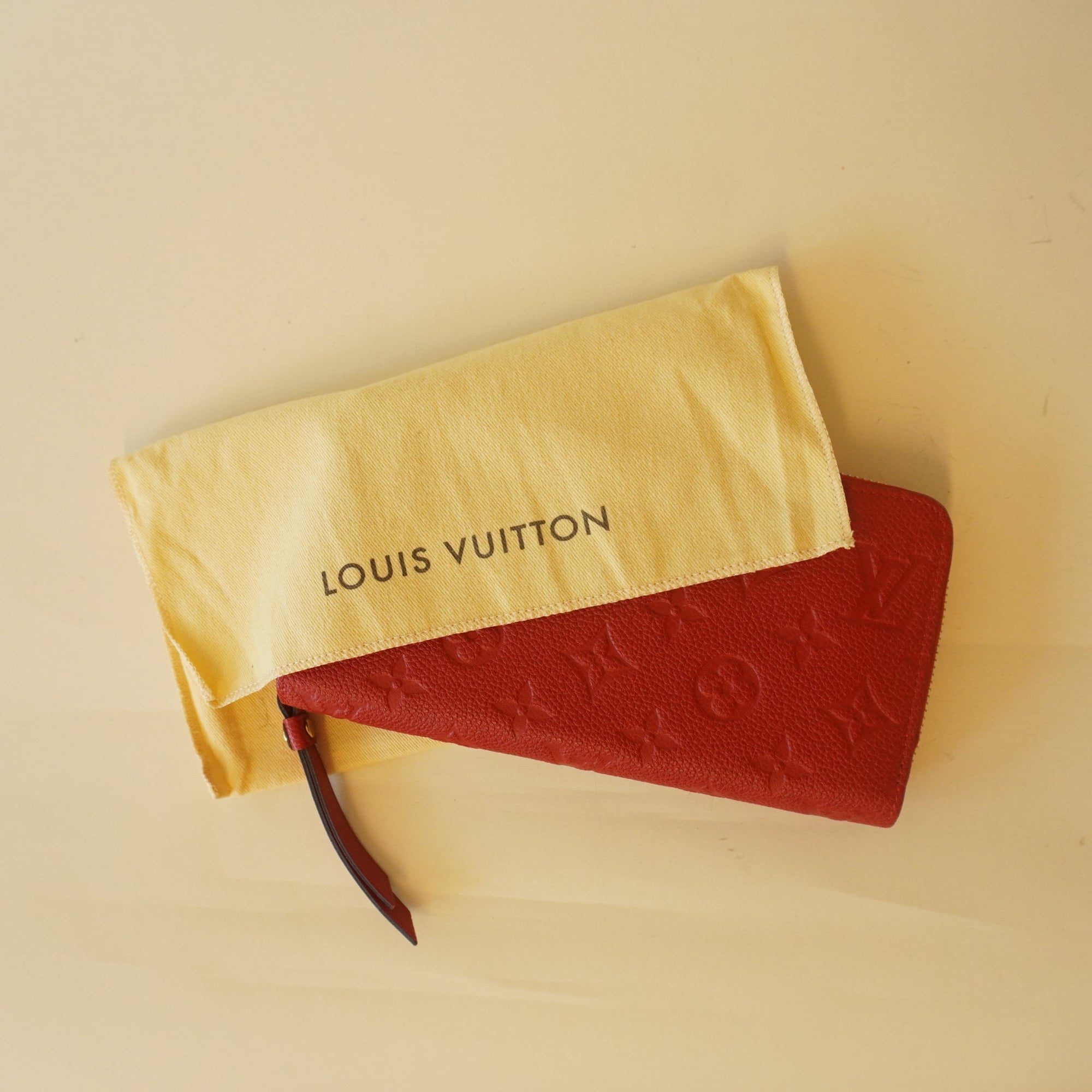 PRE-OWNED - Red Monogram Empreinte Leather Zippy Wallet