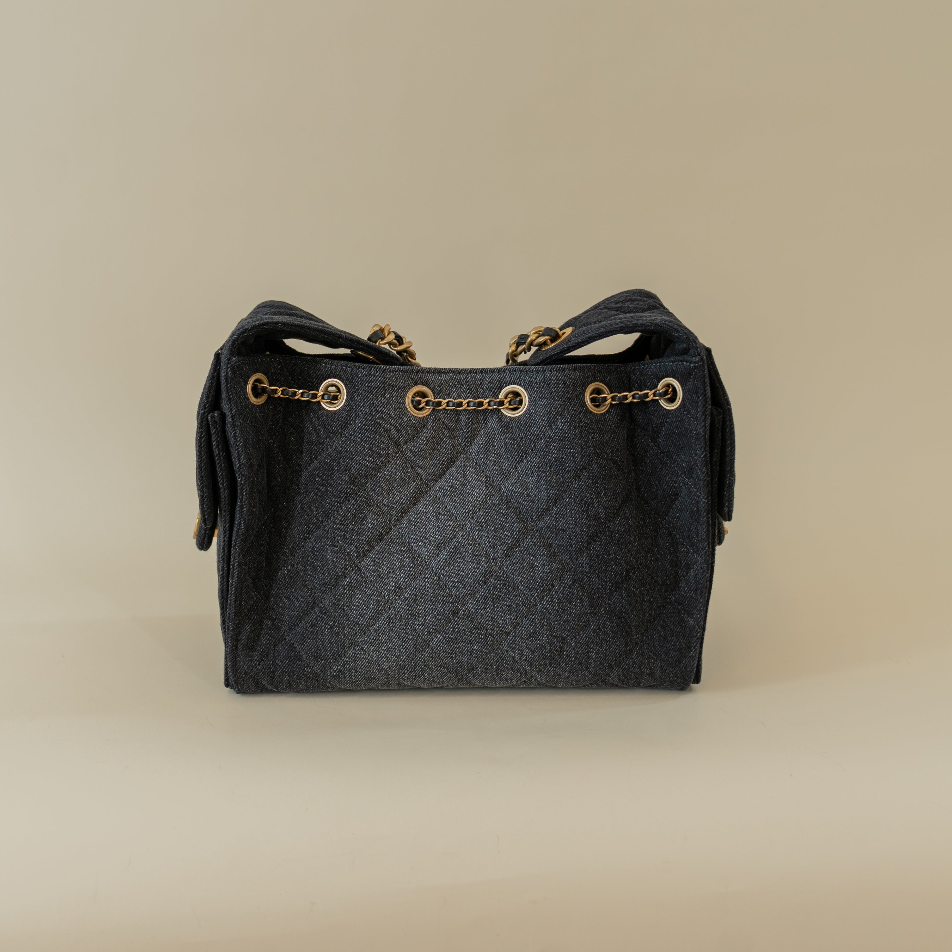 PRE-OWNED Denim Quilted Small Chanel 25 Handbag Black