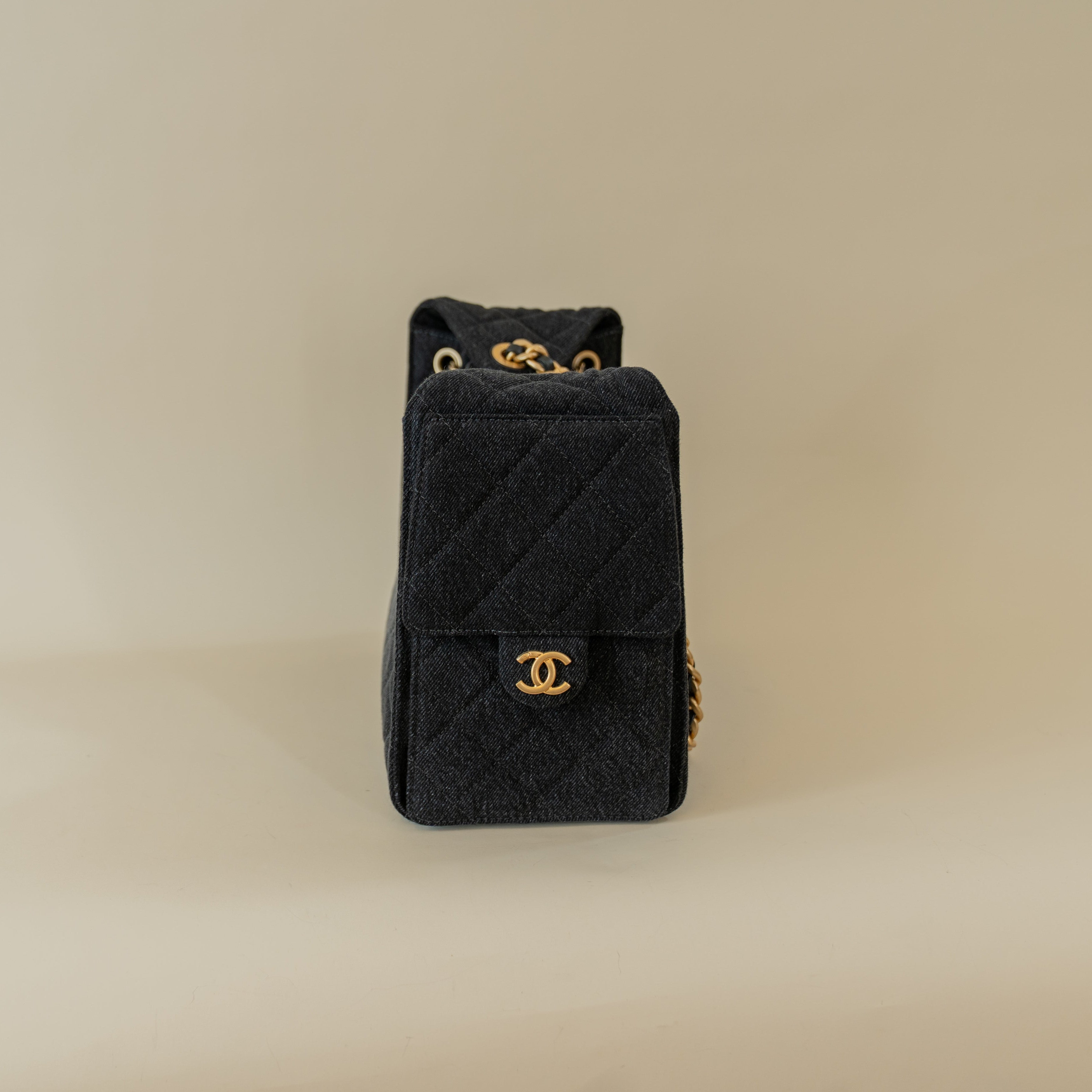PRE-OWNED Denim Quilted Small Chanel 25 Handbag Black
