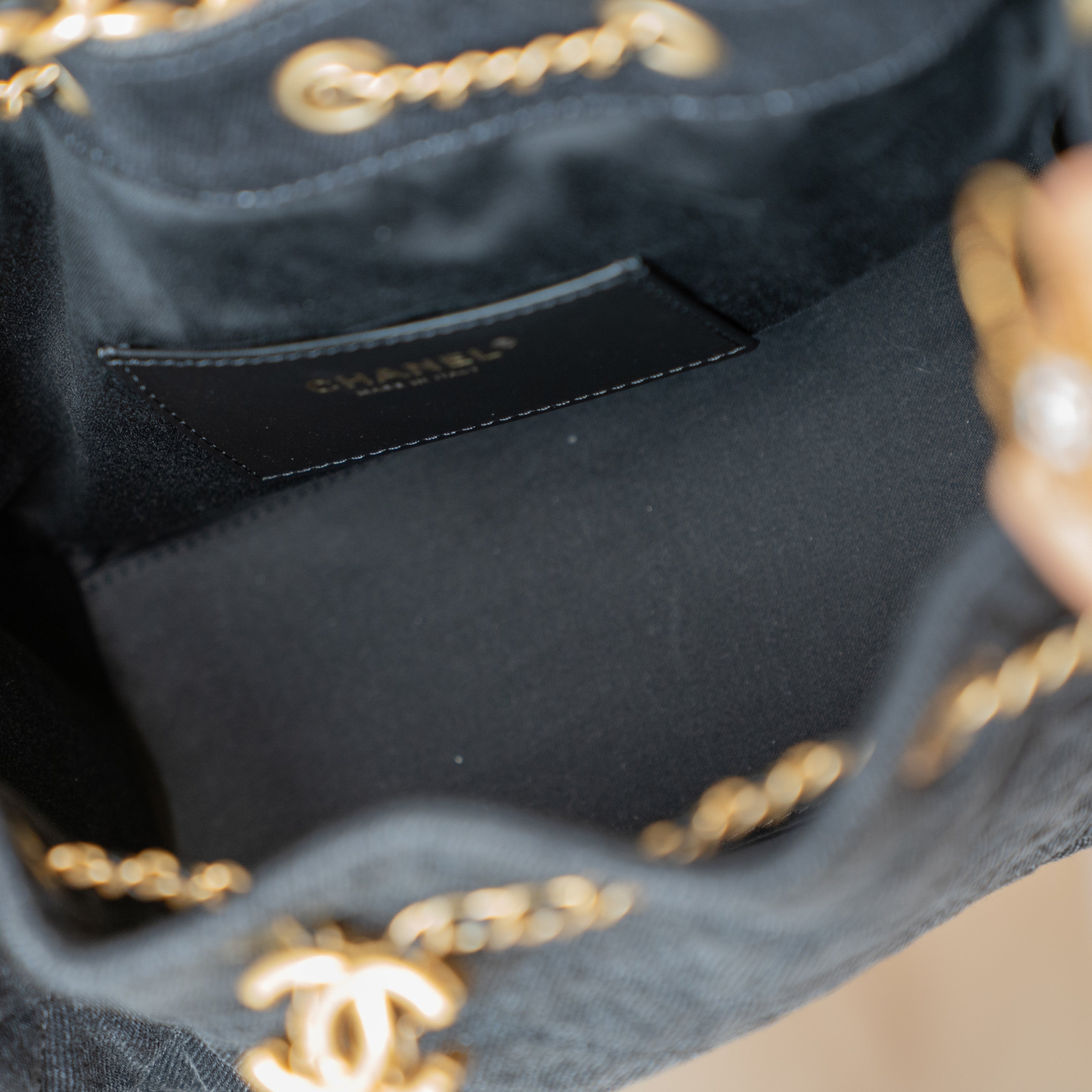 PRE-OWNED Denim Quilted Small Chanel 25 Handbag Black