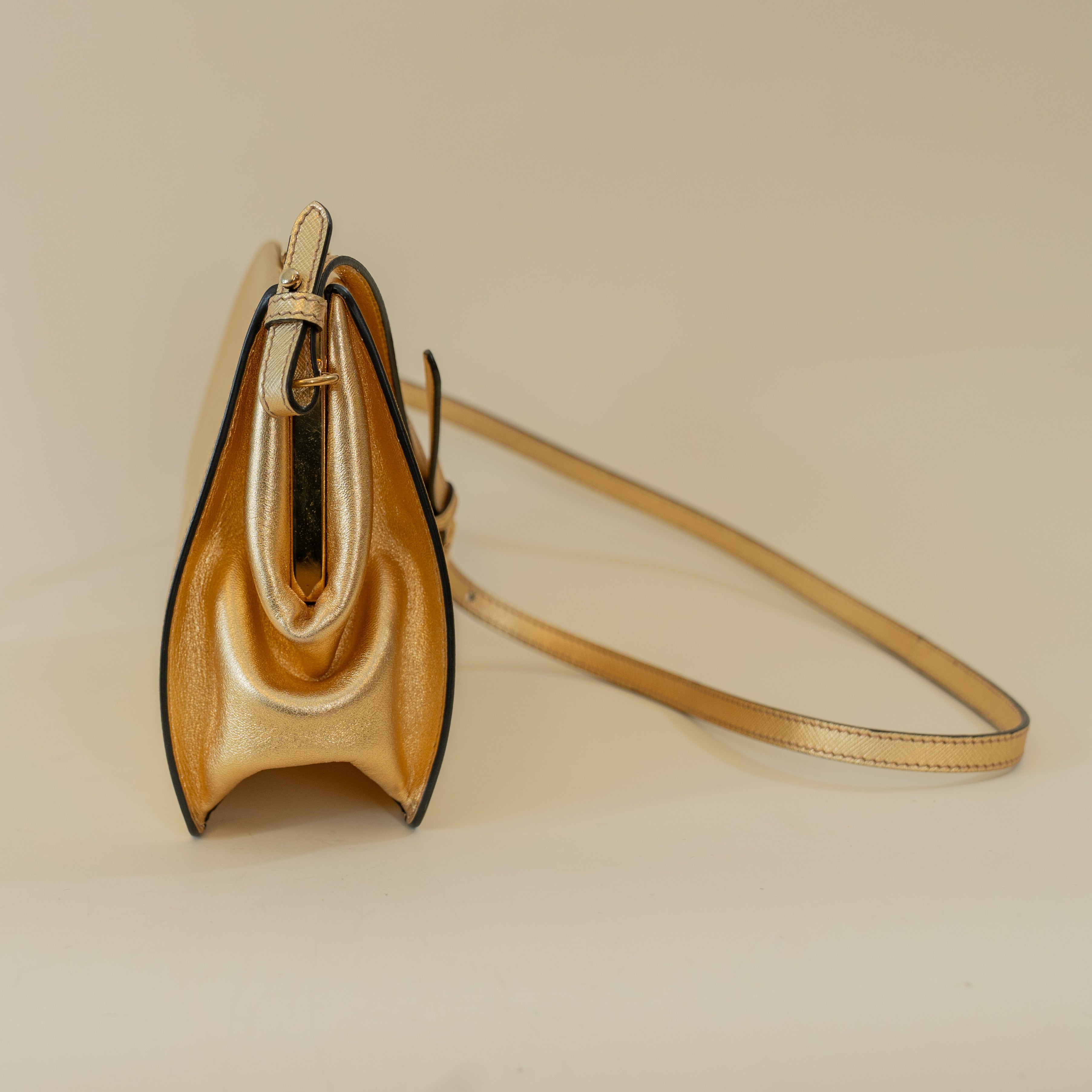 PRE-OWNED Gold Saffiano Light Frame Crossbody Bag