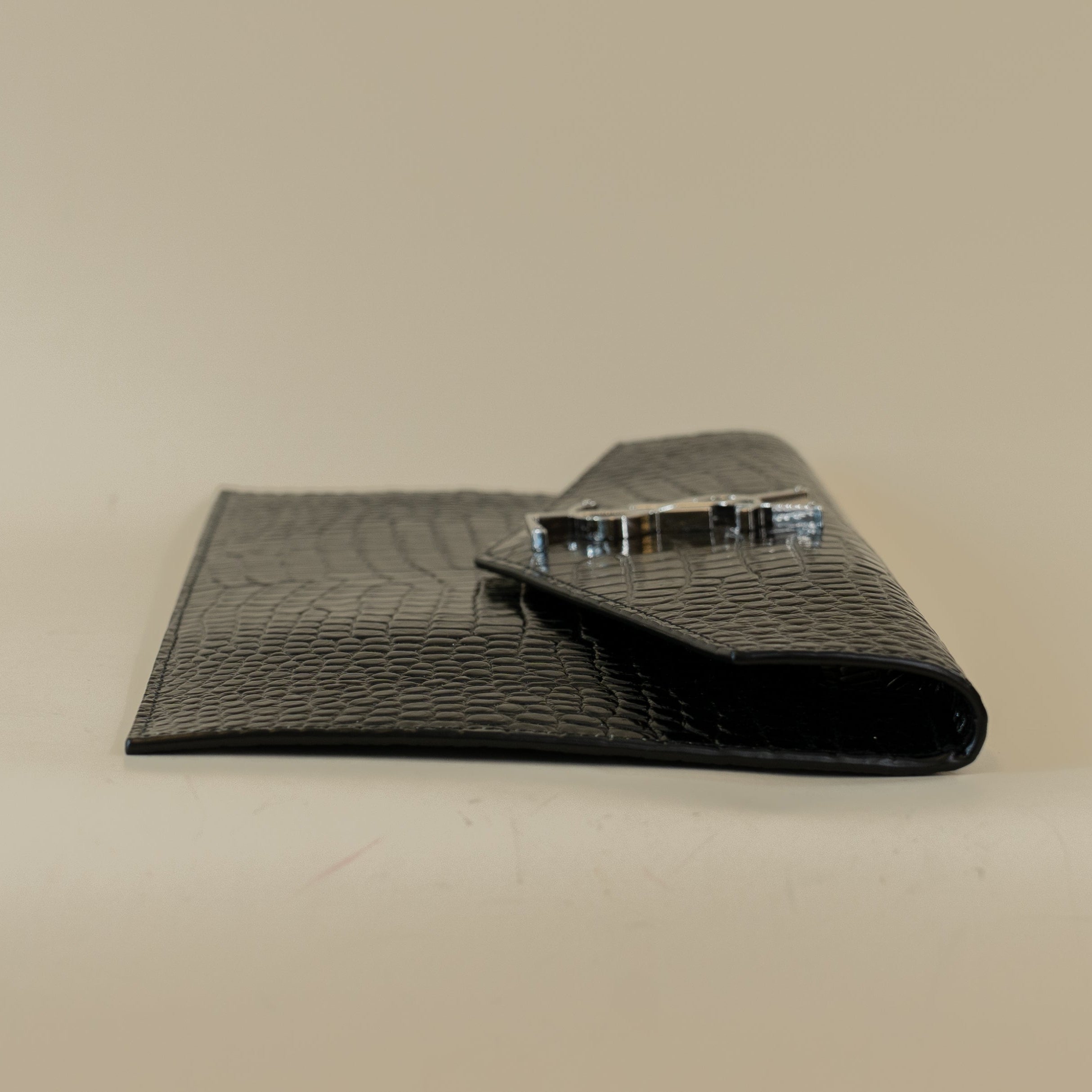 PRE-OWNED Black Calfskin Crocodile Embossed Uptown Monogram Clutch