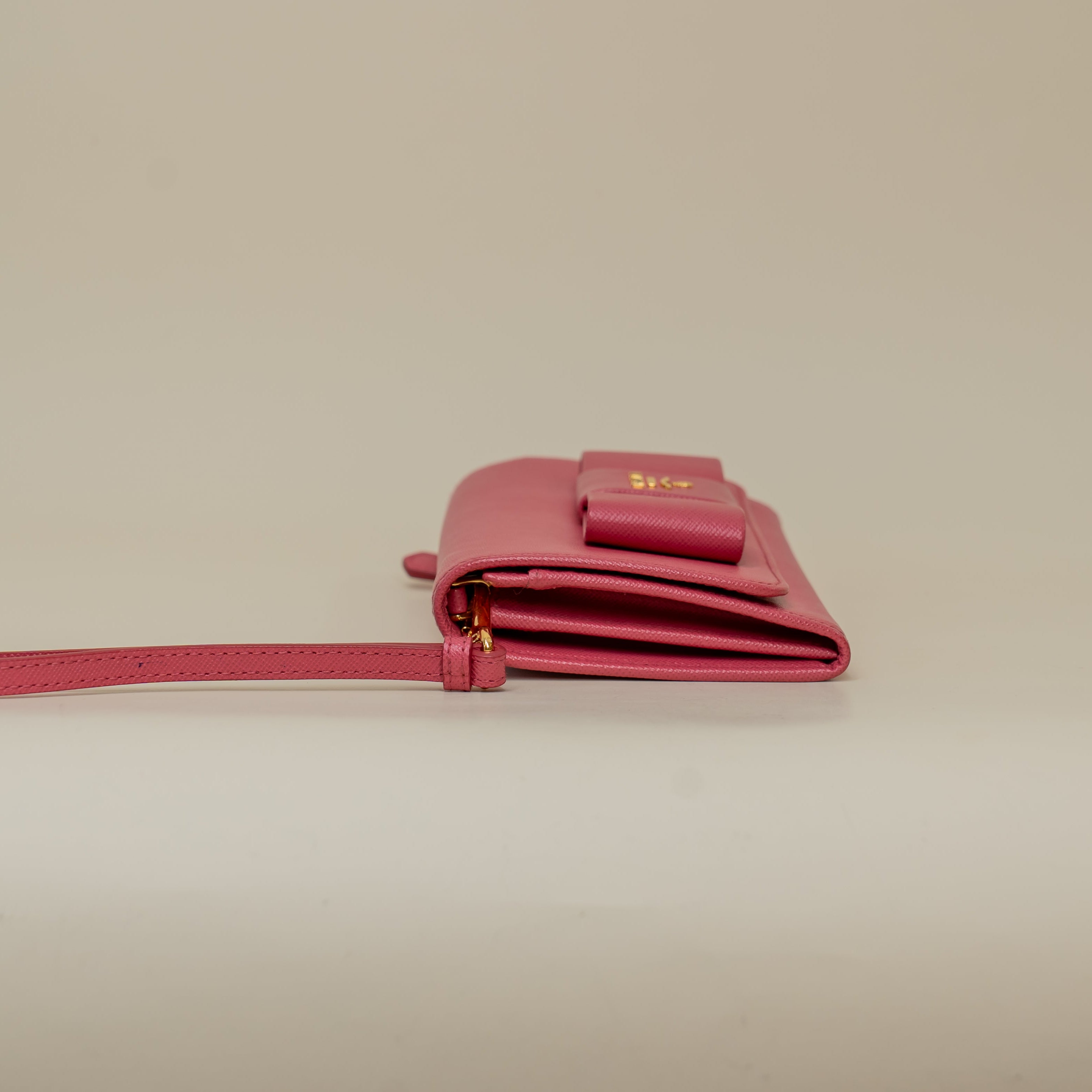 PRE-OWNED Pink Saffiano Leather Bow Wristlet Wallet
