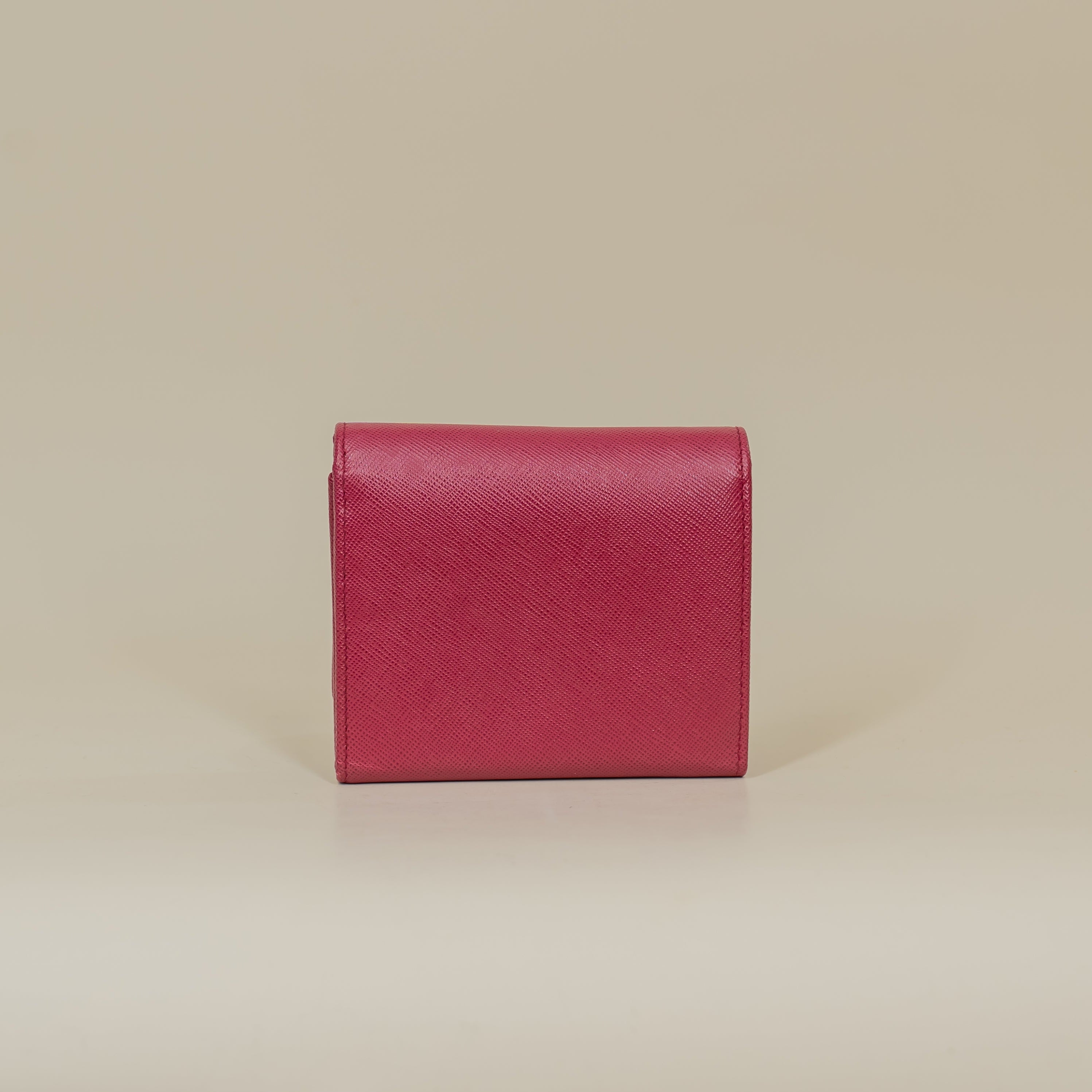 PRE-OWNED Pink Saffiano Metal French Flap Compact Wallet