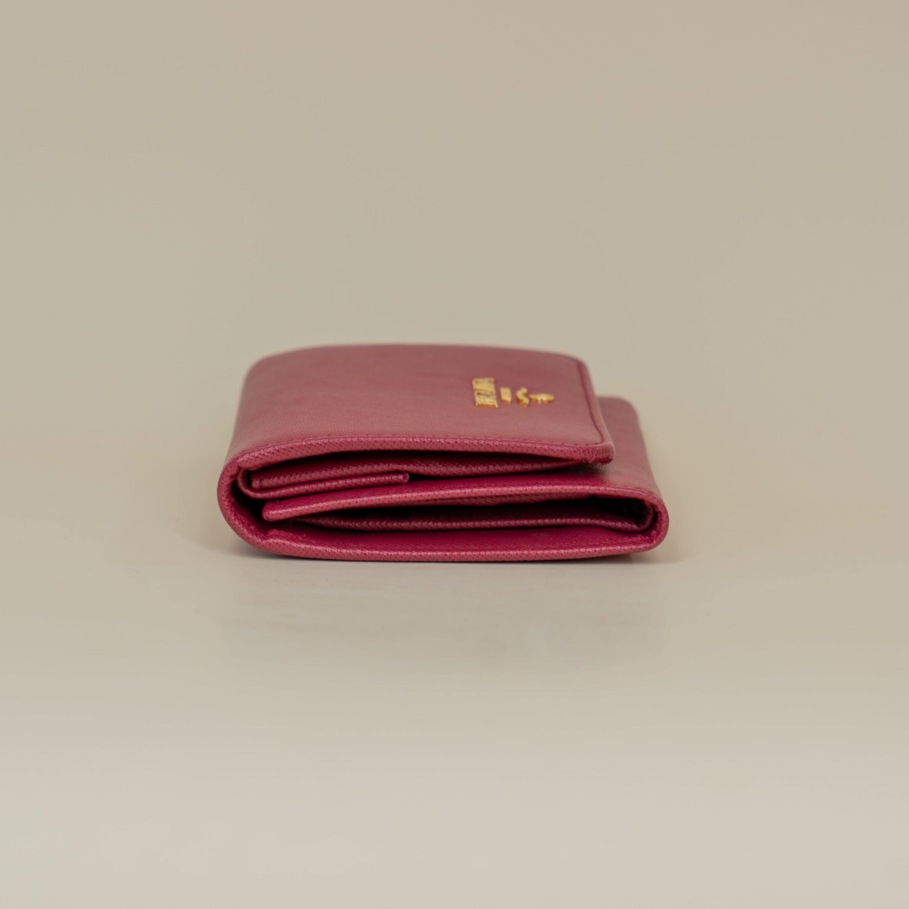 PRE-OWNED Pink Saffiano Metal French Flap Compact Wallet