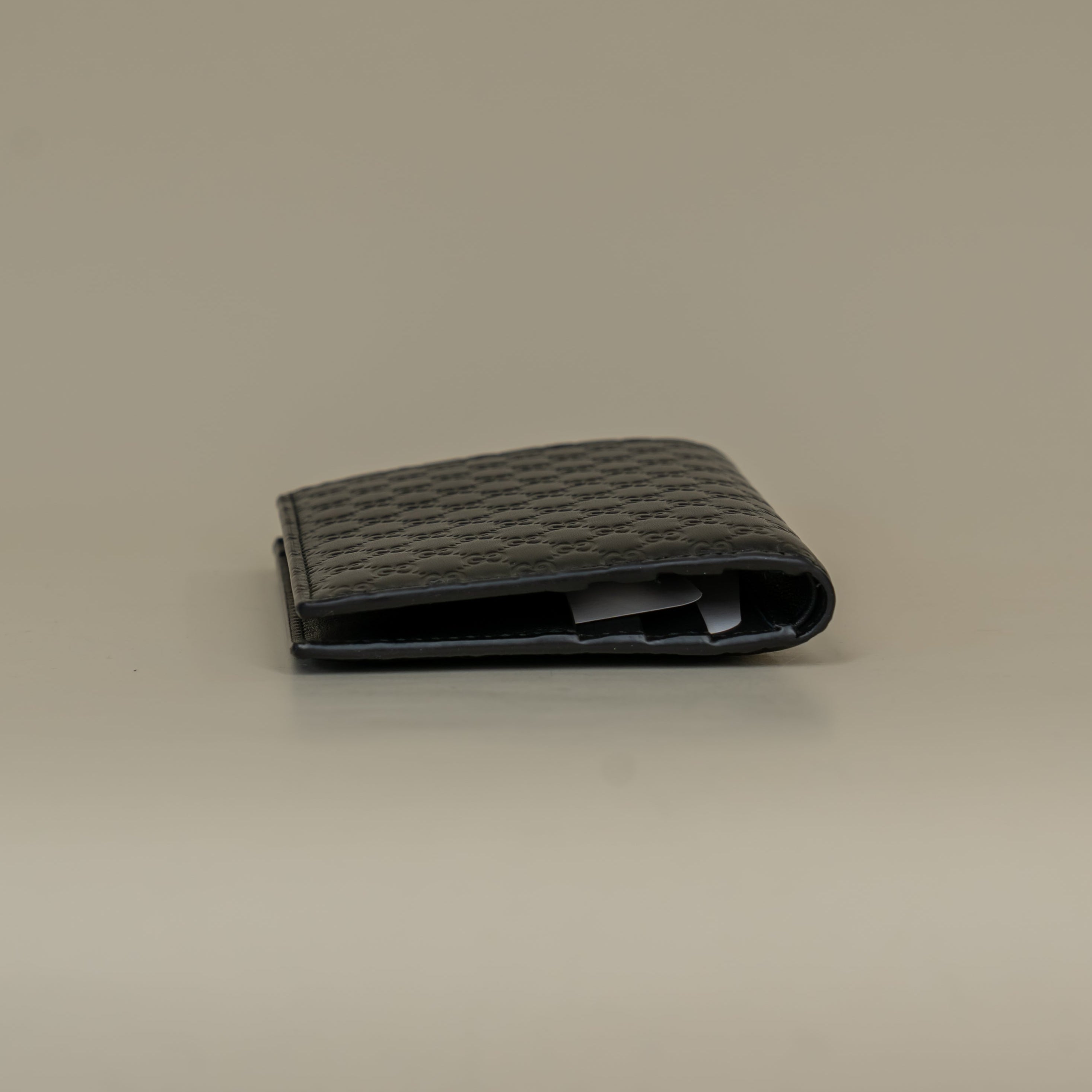 PRE-OWNED Microguccissima Bifold Black Wallet