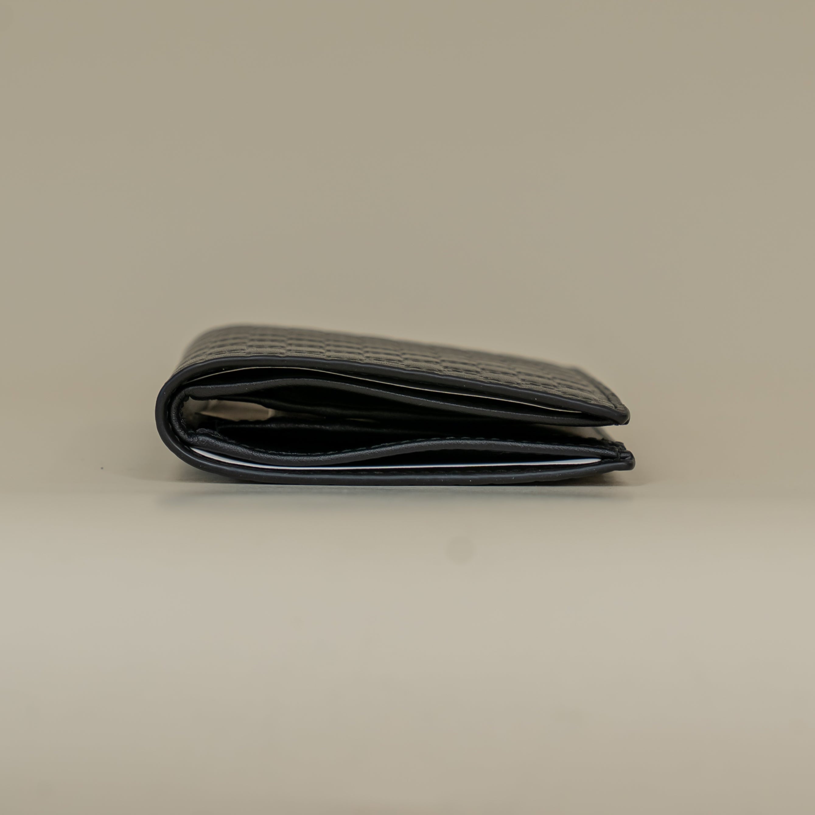 PRE-OWNED Microguccissima Bifold Black Wallet