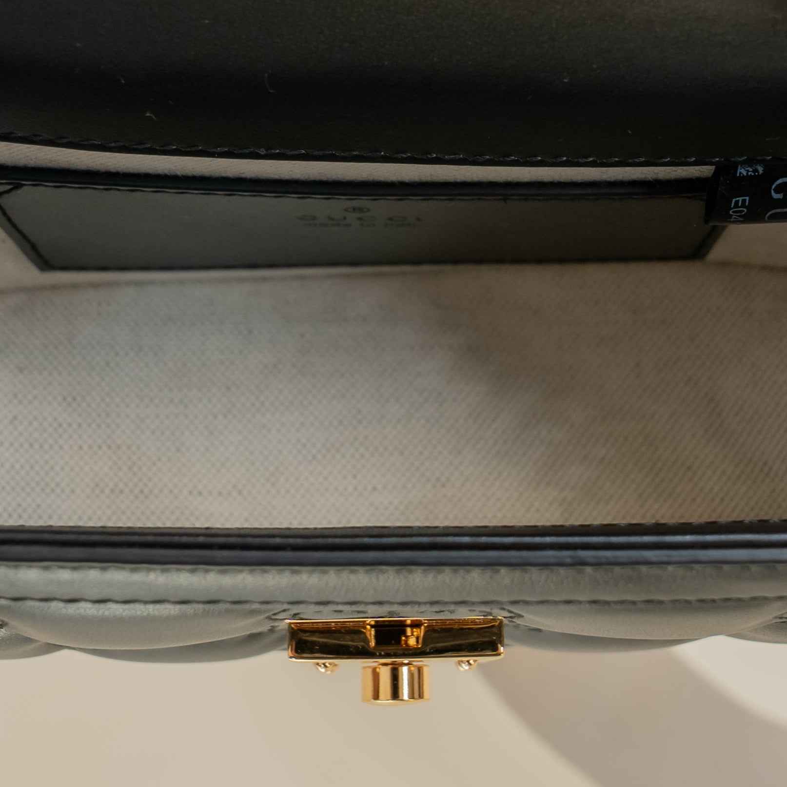 PRE-OWNED Black Calfskin GG Matelasse Mini Top Handle Shoulder Bag