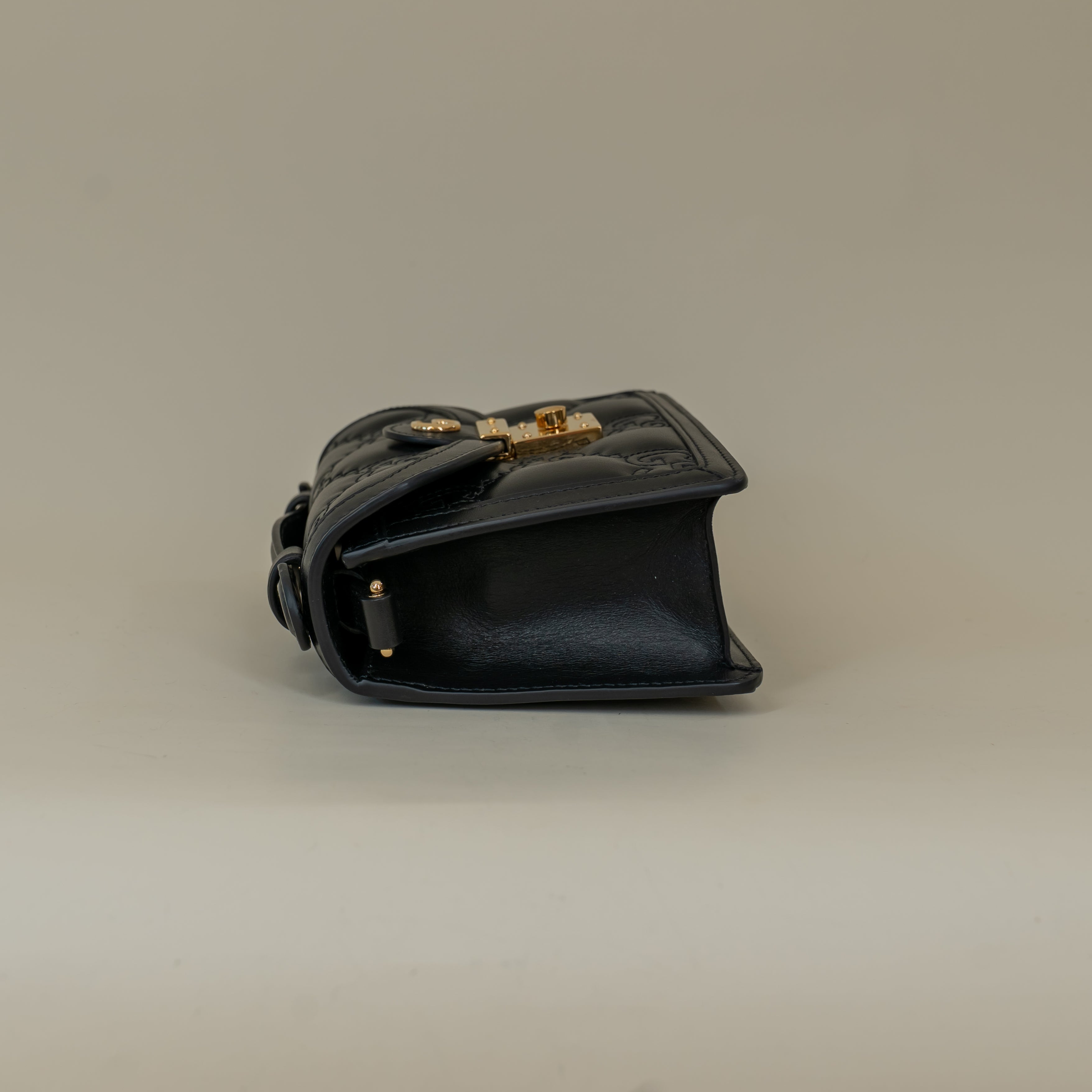 PRE-OWNED Black Calfskin GG Matelasse Mini Top Handle Shoulder Bag