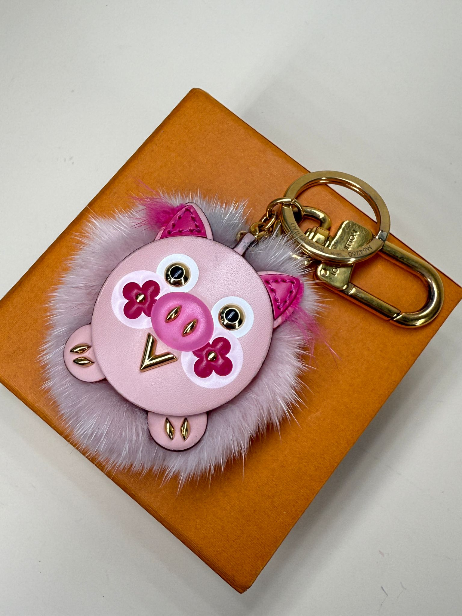 PRE-OWNED LV Calfskin Mink Fur Wild Pig Bag Charm Key Holder