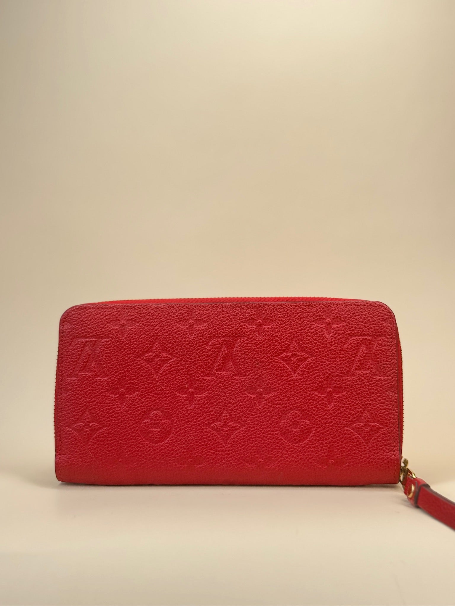 PRE-OWNED LV Red Monogram Empreinte Calfskin Zippy Long Wallet