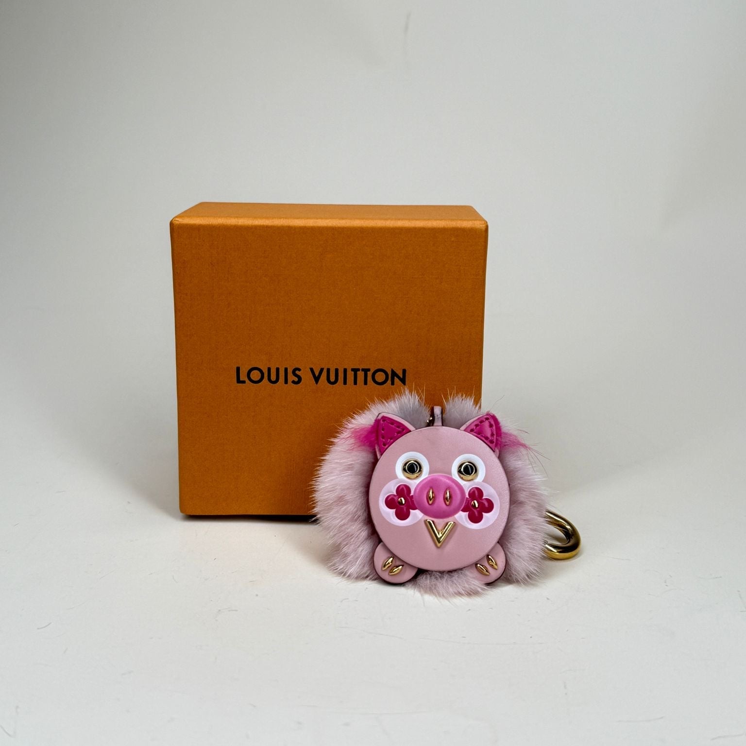 PRE-OWNED LV Calfskin Mink Fur Wild Pig Bag Charm Key Holder 