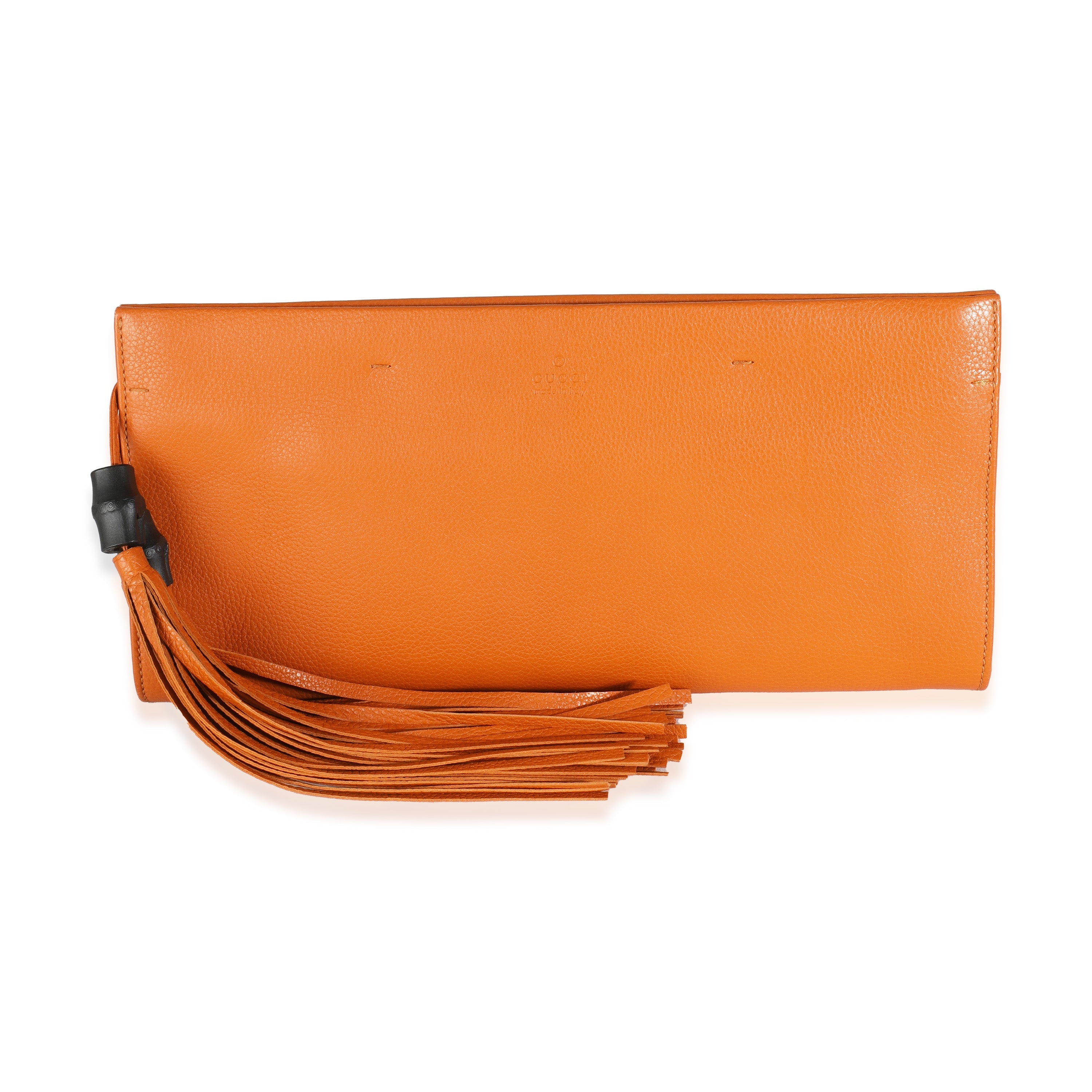 Clutch plano con borlas de piel de becerro granulada color naranja GG USADO 