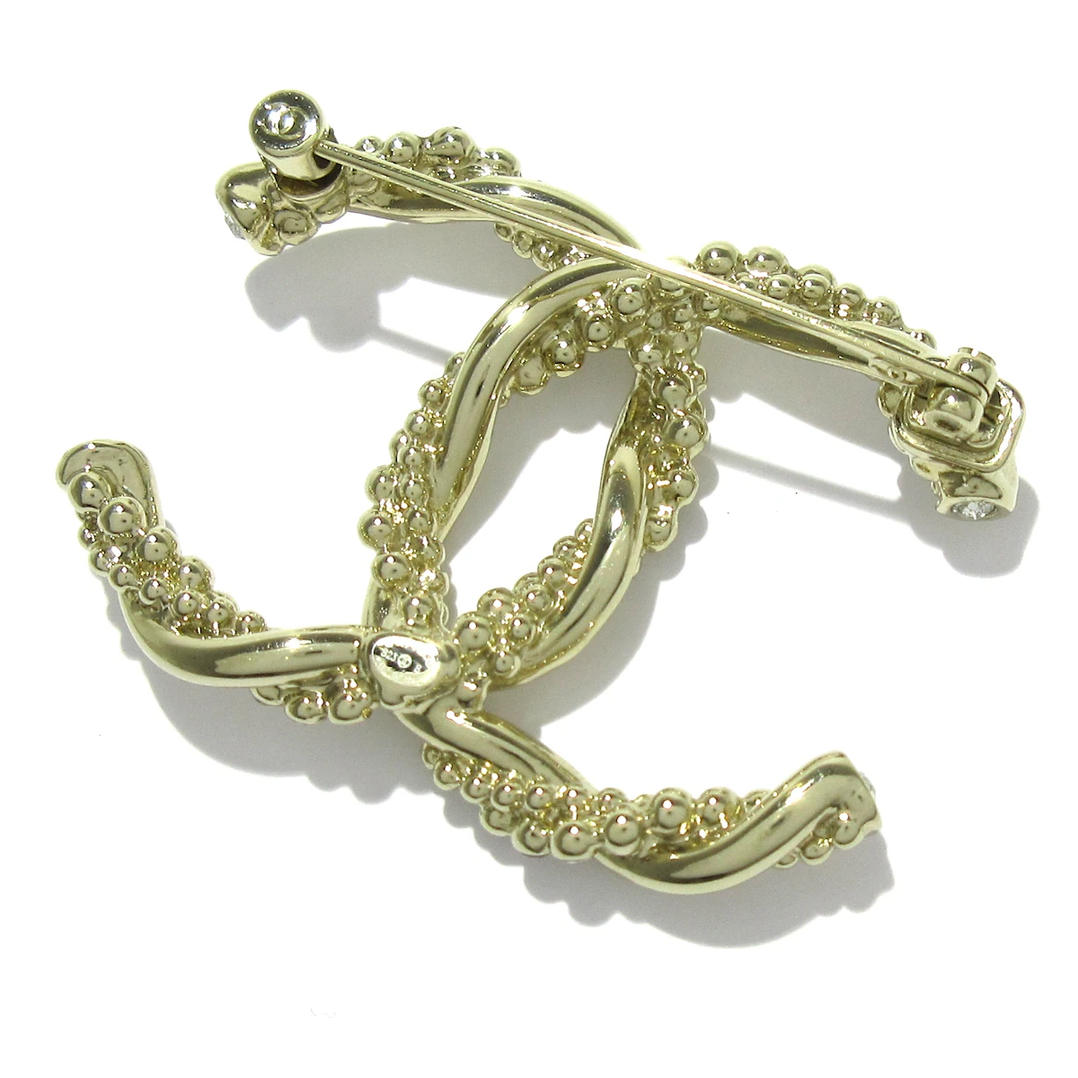 CHANEL - Broche Coco dorado champán con herrajes transparentes y diamantes de imitación