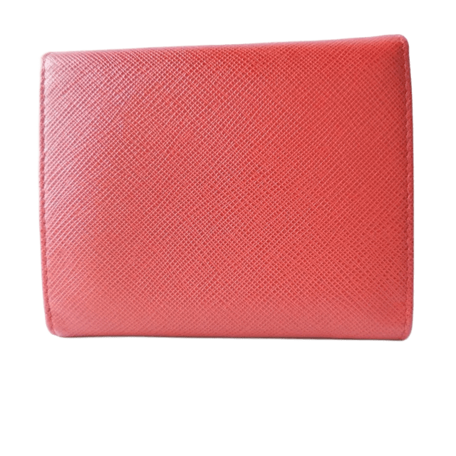 Cartera de tres pliegues de cuero rojo de segunda mano