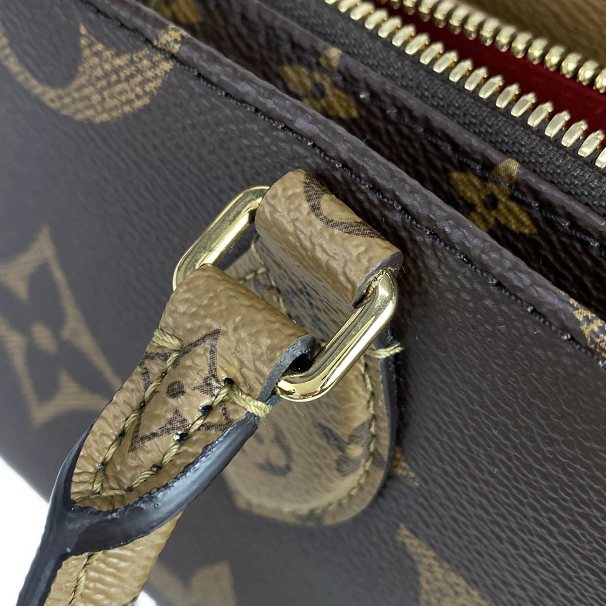 PRE-OWNED LV On The Go EW Monogram Reverse Crossbody Bag