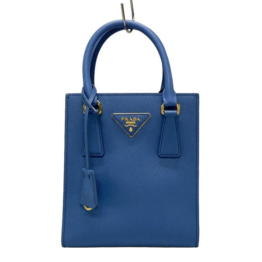 Bolso de hombro de piel saffiano azul claro con logotipo triangular USADO