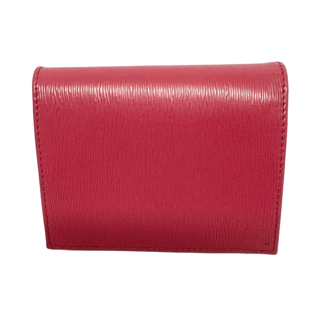 Cartera plegable de cuero rosa oscuro de segunda mano