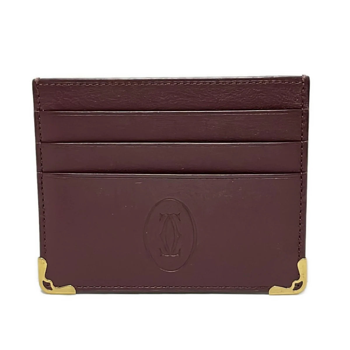 Estuche para tarjetas Must Line de piel color burdeos dorado USADO