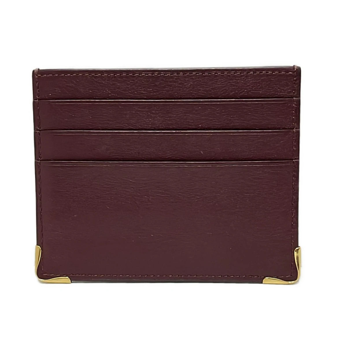 Estuche para tarjetas Must Line de piel color burdeos dorado USADO