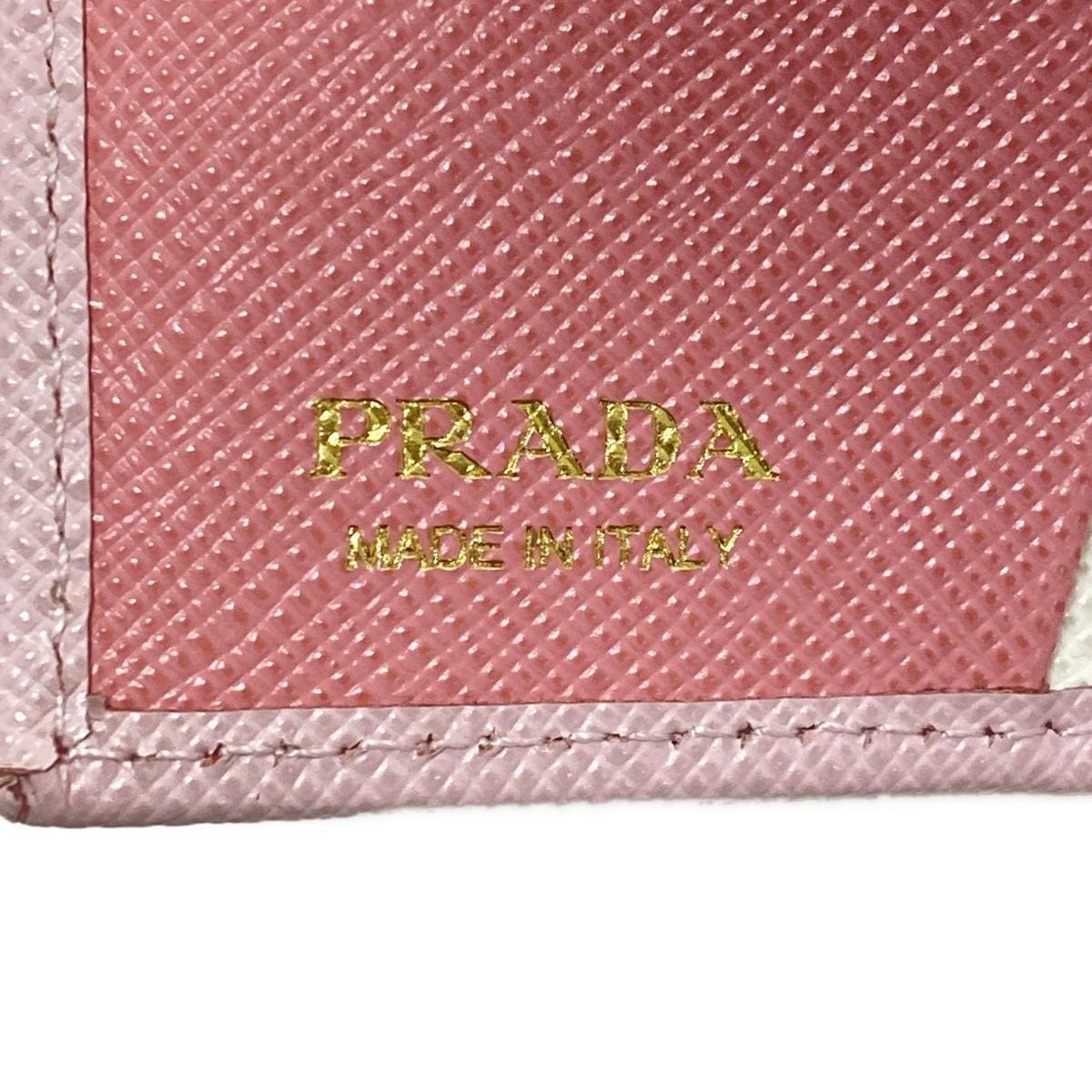 Cartera plegable de piel saffiano rosa claro de segunda mano