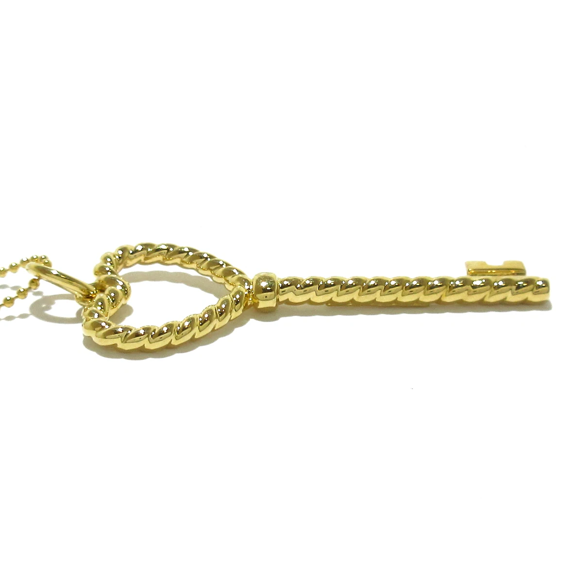 PRE-OWNED Twisted heart key 18K Yellow Gold Necklace